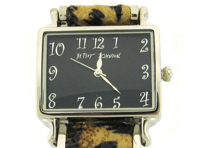 BETSEY JOHNSON Leopard Metal Bracelet Watch BJ6026: The watch has the following features: Rectangular black dial; Stainless steel case; Silvertone with Leopard metal band; Case measures: 1-1/8 inches X 7/8 inch; 3 hand movement; and Silver tone clasp.
