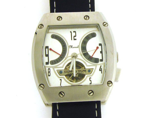 Marcel Drucker Men's 23-787S Stainless Steel Day a: This is a Marcel Drucker Men's 23-787S Stainless Steel Day and Date Automatic Watch with the following features: Mineral dial window; Analog display; Buckle clasp; Stainless Steel case; 43 mm Case dia