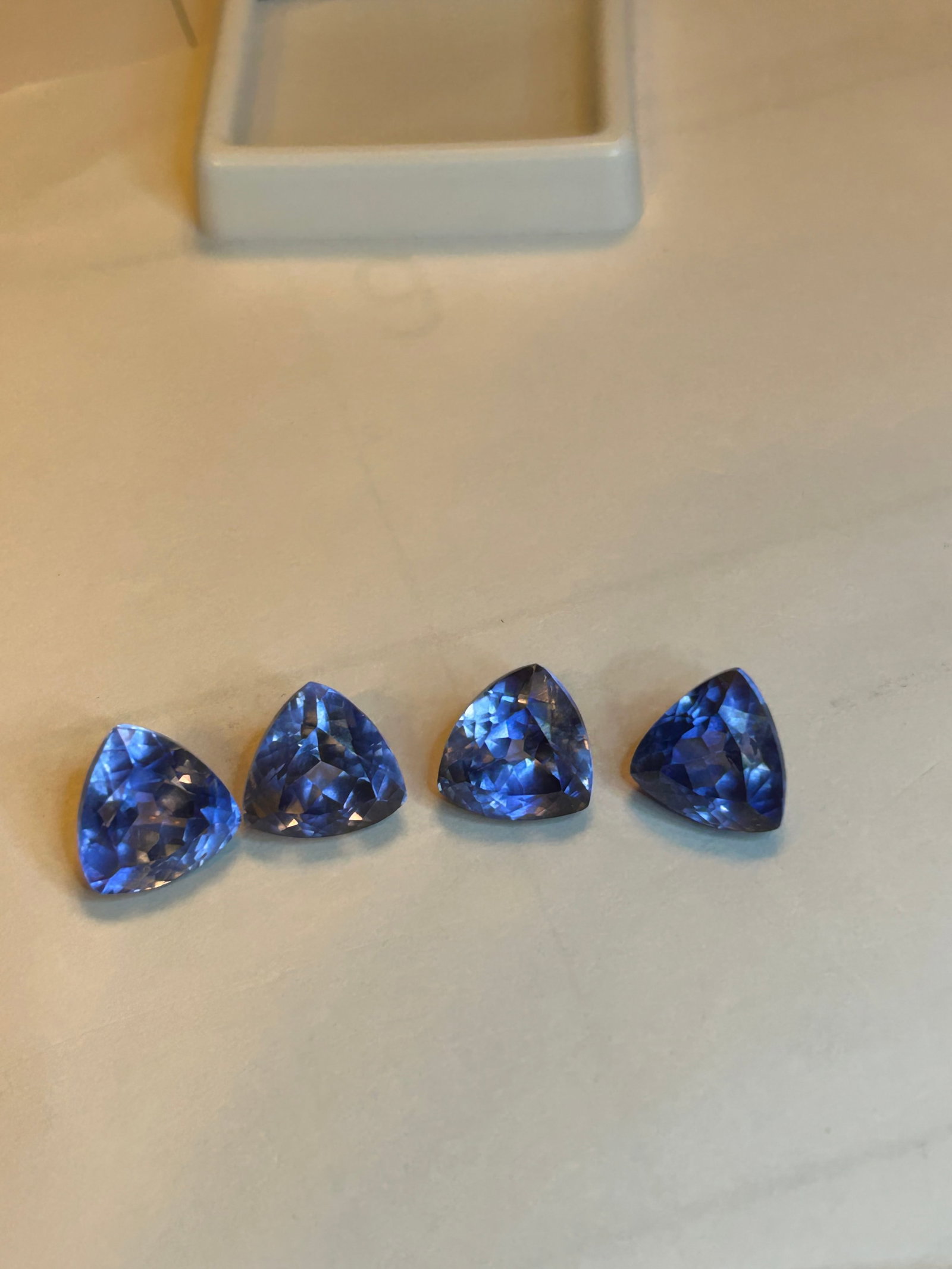 Natural Purple Blue Tanzanite 11 ct: captivating blend of violet and blue hues, showcasing strong color saturation, often displaying deep, twilight-like tones, exceptional clarity (Flawless to VVS), excellent cut, and exhibiting unique c