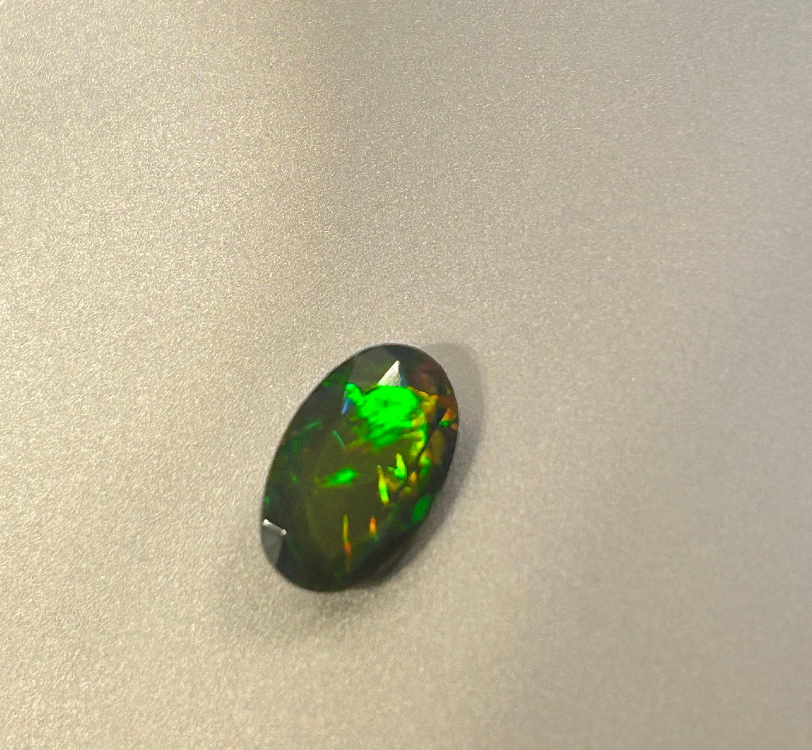 Natural Black Flashing Opal 1.68 ct Oval cut (1 of 2)
