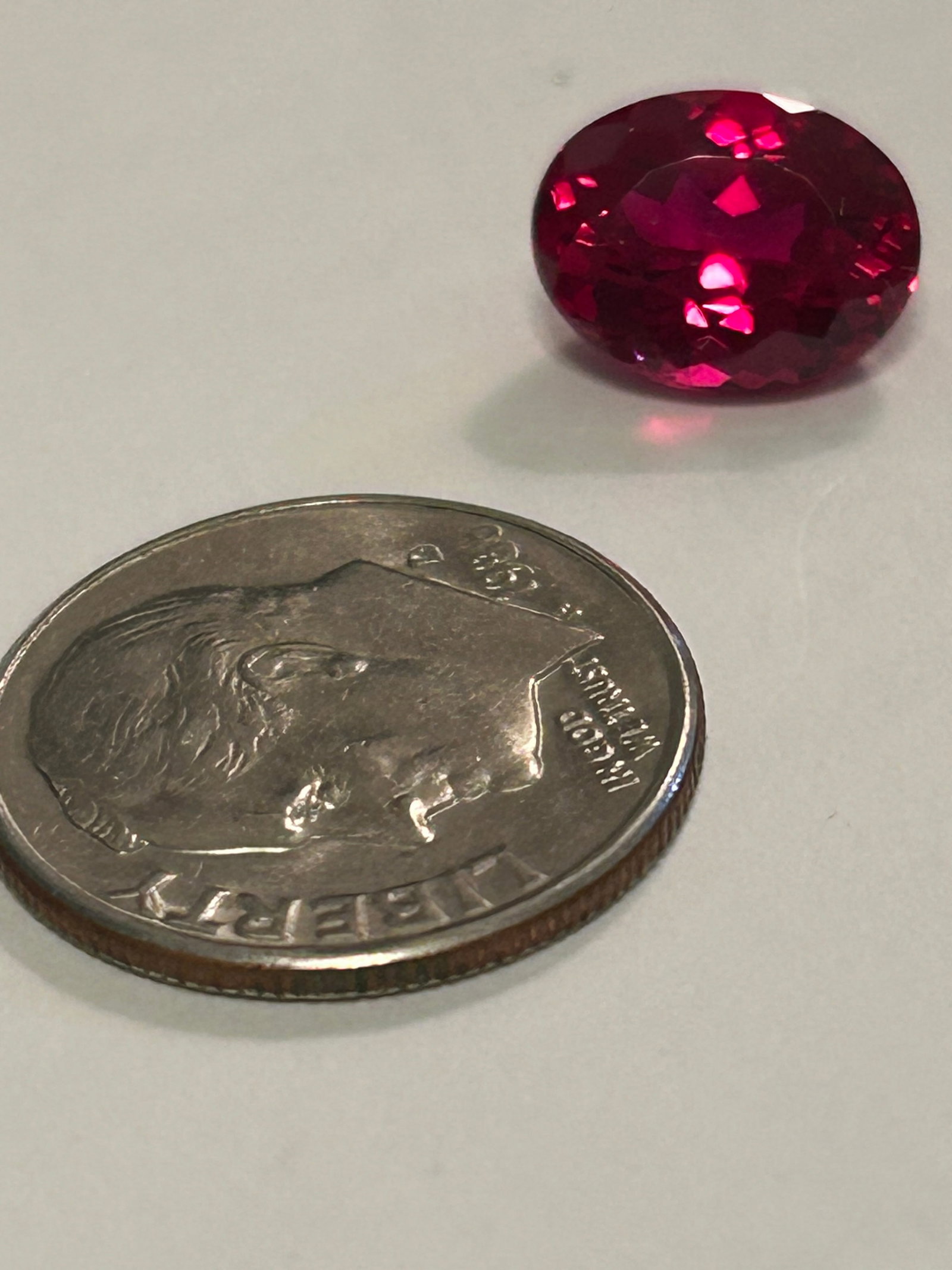 Stunning Natural Red Painite 3.85 Ct Oval cut: An exceptionally rare, top-quality Burmese gemstone featuring a brilliant oval cut. Sourced from Mogok, Myanmar, this faceted, eye-clean stone boasts a vibrant, deep red color.