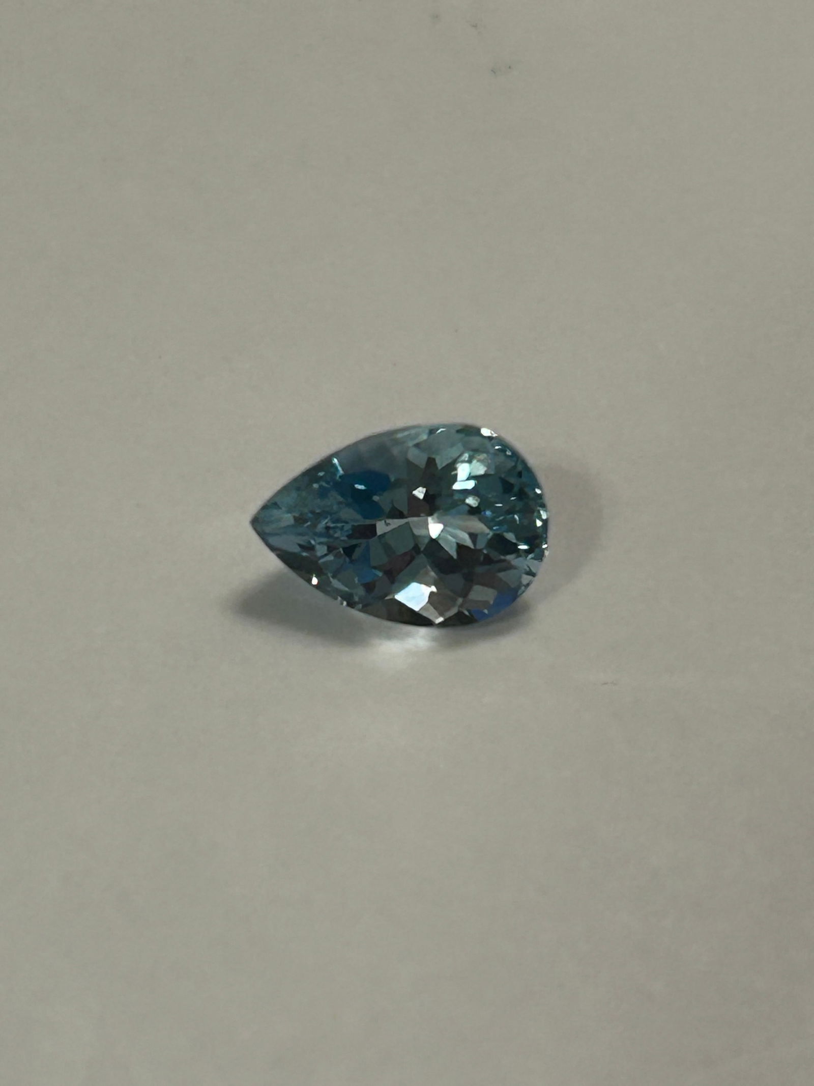 Natural Sky Blue Topaz 1.91ct Pear Cut From Brazil: This Sky Blue Topaz from Brazil is a vibrant, light blue gemstone often compared to aquamarine. Featuring excellent cut and clarity, this pear-shaped stone is ideal for pendants or rings due to its