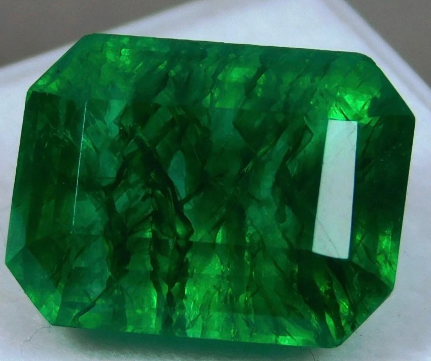 Natural Emerald 11 Ct Emerald cut from Columbia: Colombian emerald is an exceptionally rare, high-value, and large gemstone featuring a rich, vivid green hue, characteristic of mines in Muzo.