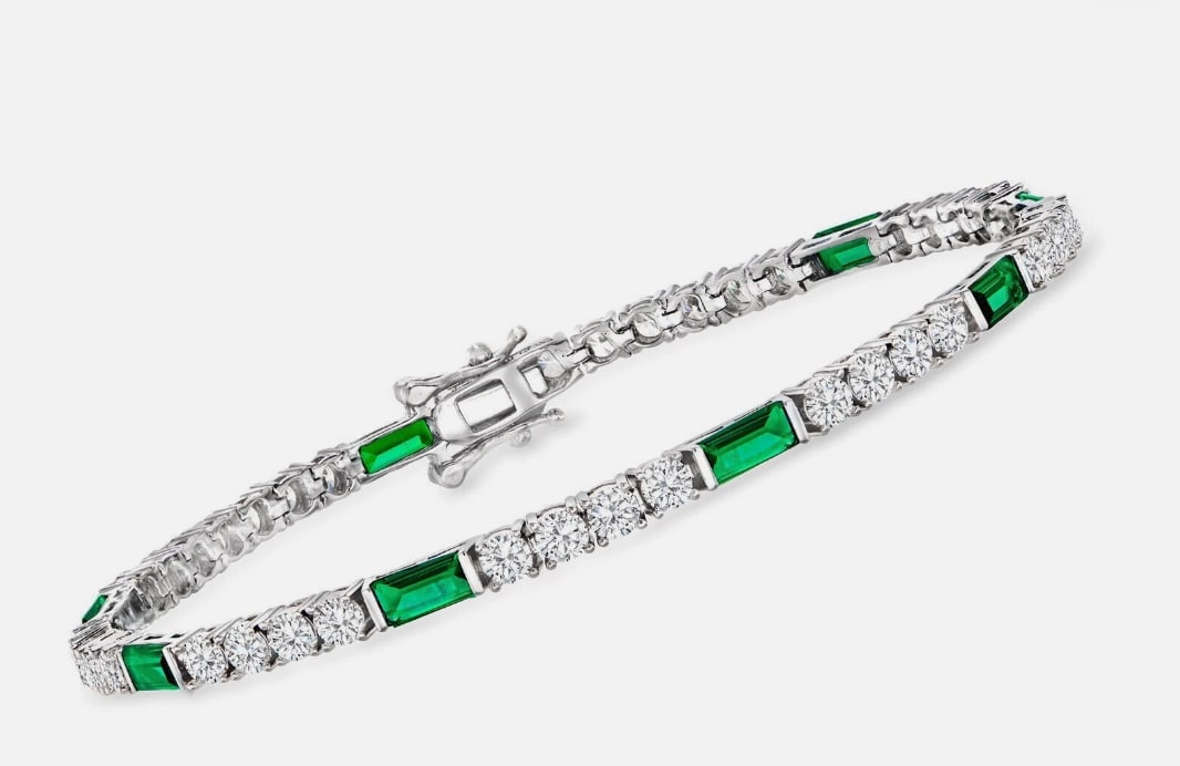 7 ctw Diamond and Emerald Tennis Bracelet: a luxurious, high-carat jewelry piece featuring approximately 7 carats of emerald-cut or princess-cut stones. Set in 14K white gold, offering a sophisticated, durable design with intense green color