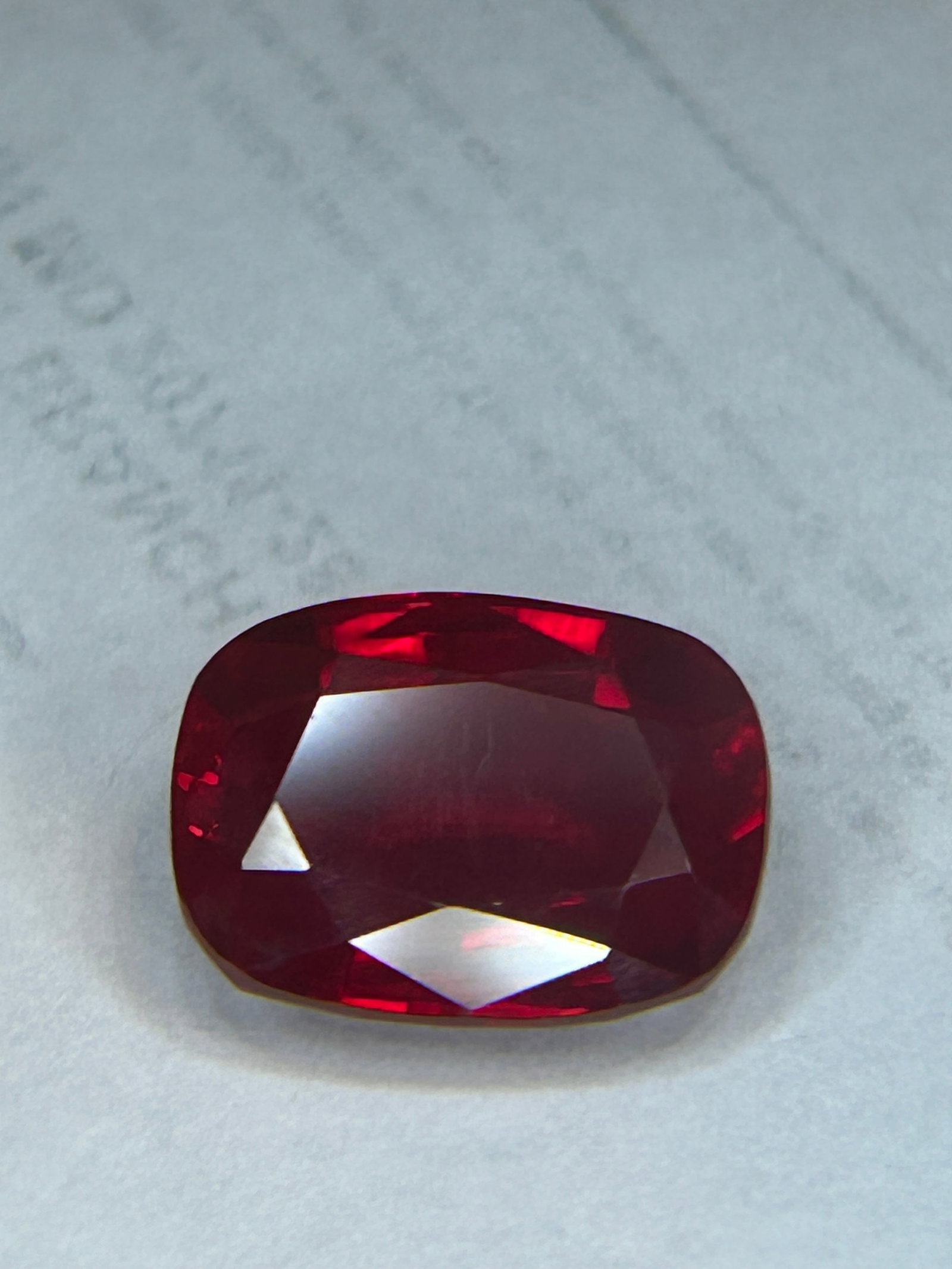 8ct Natural Pigeon Blood Ruby Oval Cut from Burma: Natural Pigeon Blood Ruby, featuring an oval cut, is a valuable gemstone characterized by a deep, vivid red color with subtle blue undertones, sourced from Burma. a large, high-clarity, and vividly co
