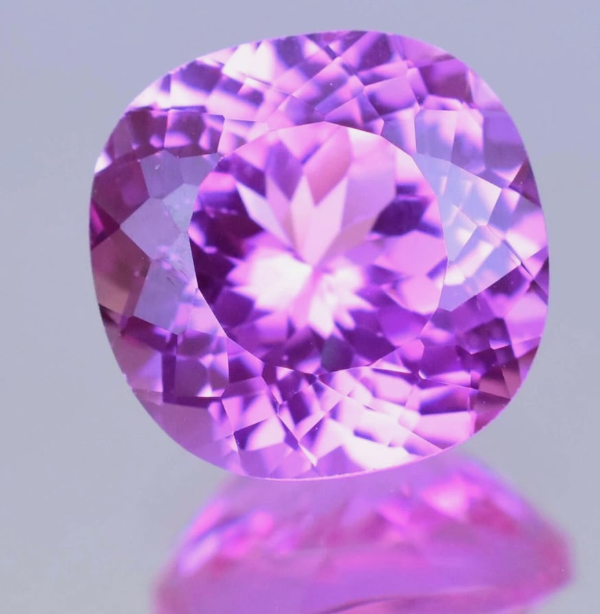 Brilliant Round Cut Pink Sapphire 8.75 ct from Sri Lanka: high-clarity gemstone exceptional brilliance, intense saturation, and excellent cut.