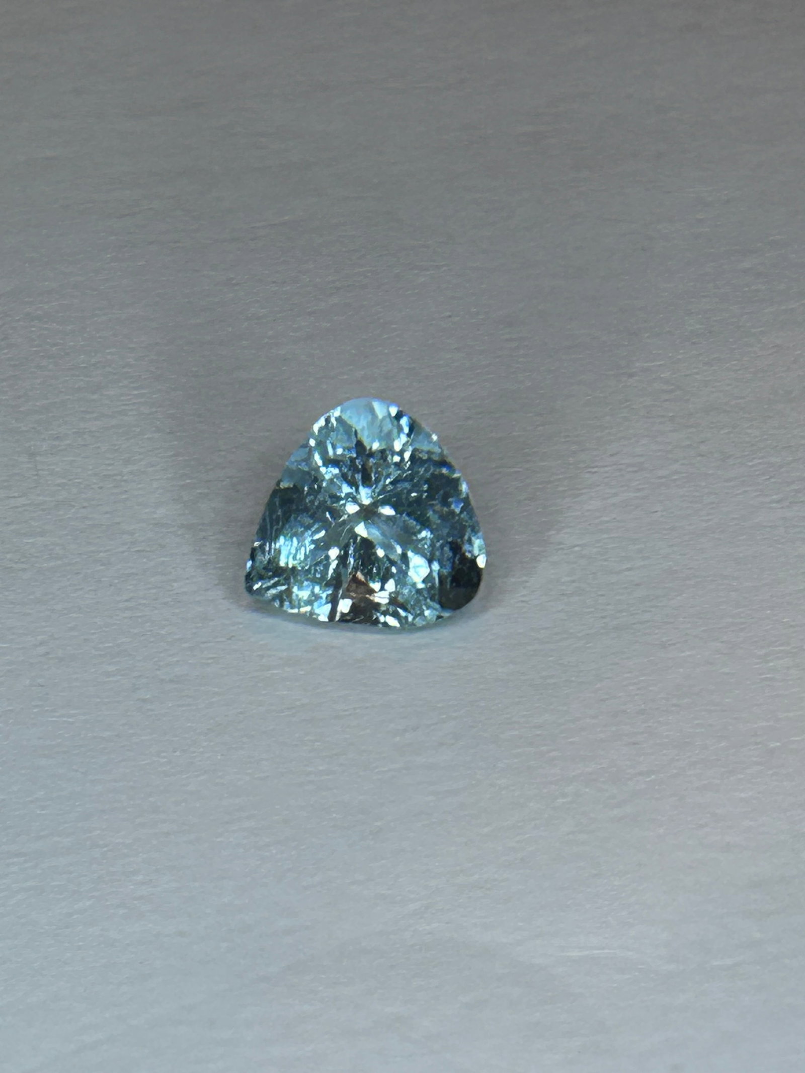 Natural Aquamarine 2..33 ct Trillion Cut from Brazil: Unique and versatile. The trillion cut enhances the natural brilliance of the aquamarines, offering a modern and elegant aesthetic that captures light beautifully With a exceptional clarity a crucial