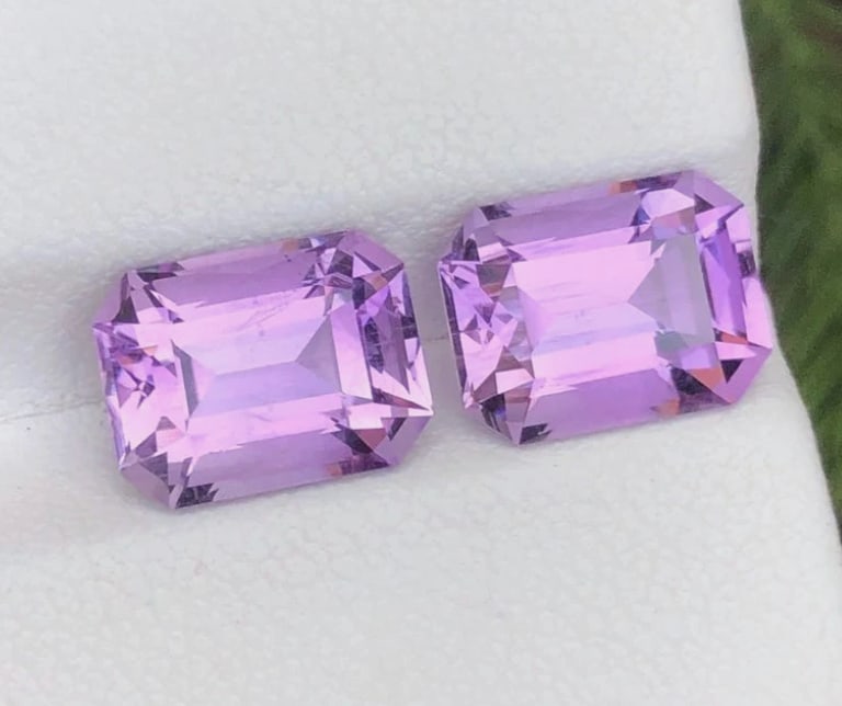 6.20 Ct Natural Purple Amethyst Emerald Cut Pair from Brazil: High-clarity, transparent stones, commonly cut into trillions, ovals, or octagons for jewelry sets. These untreated, medium purple quartz gems offer a hardness, making them excellent, durable choices