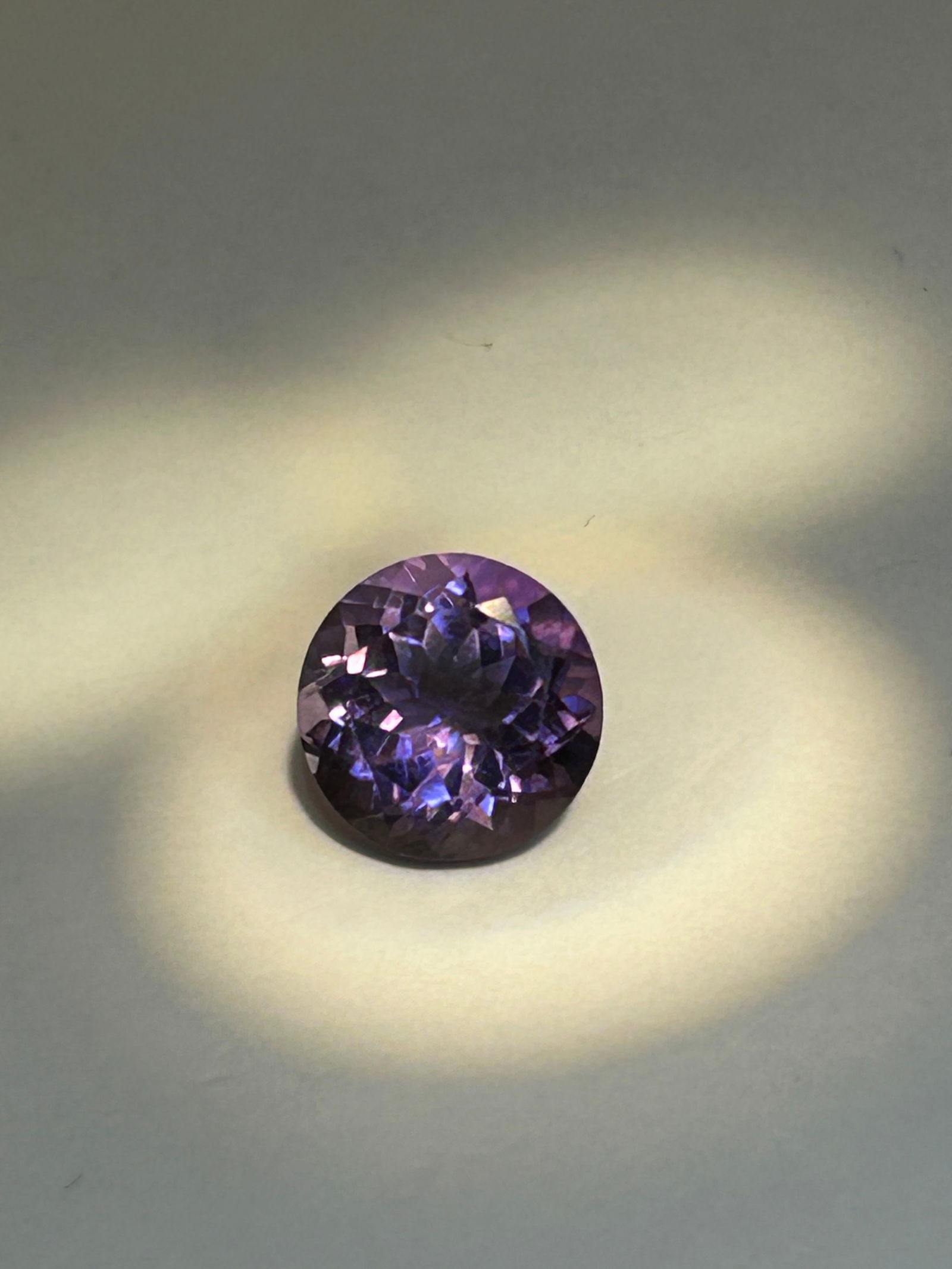 Natural Amethyst 5.59ct Round Cut High Clarity: Features a classic round cut, ideal center piece for necklaces or a ring. This stone is violet-purple in color sourced from Brazil and exhibit high clarity.