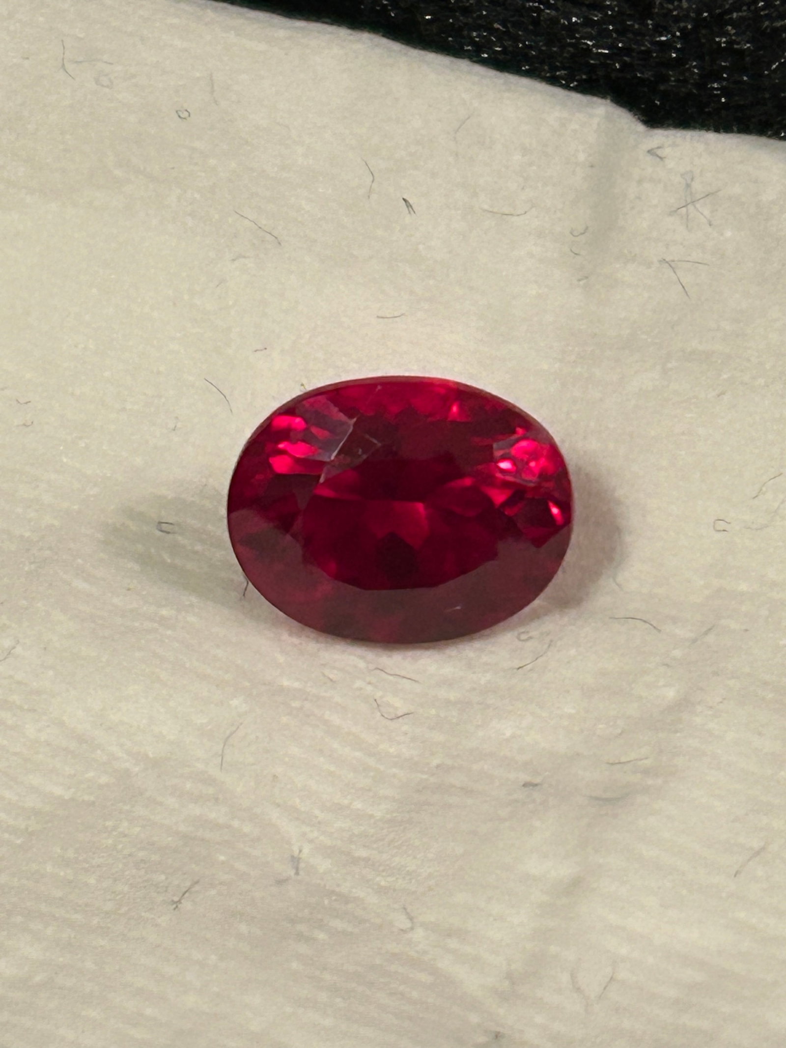 Rare Red Painite Oval Cut 10+ Ct from Burma: Transparent red painite from Myanmar is an exceptionally rare, natural, and Authenticed collector's gemstone. Painite is recognized as one of the world's rarest minerals, characterized by its deep red