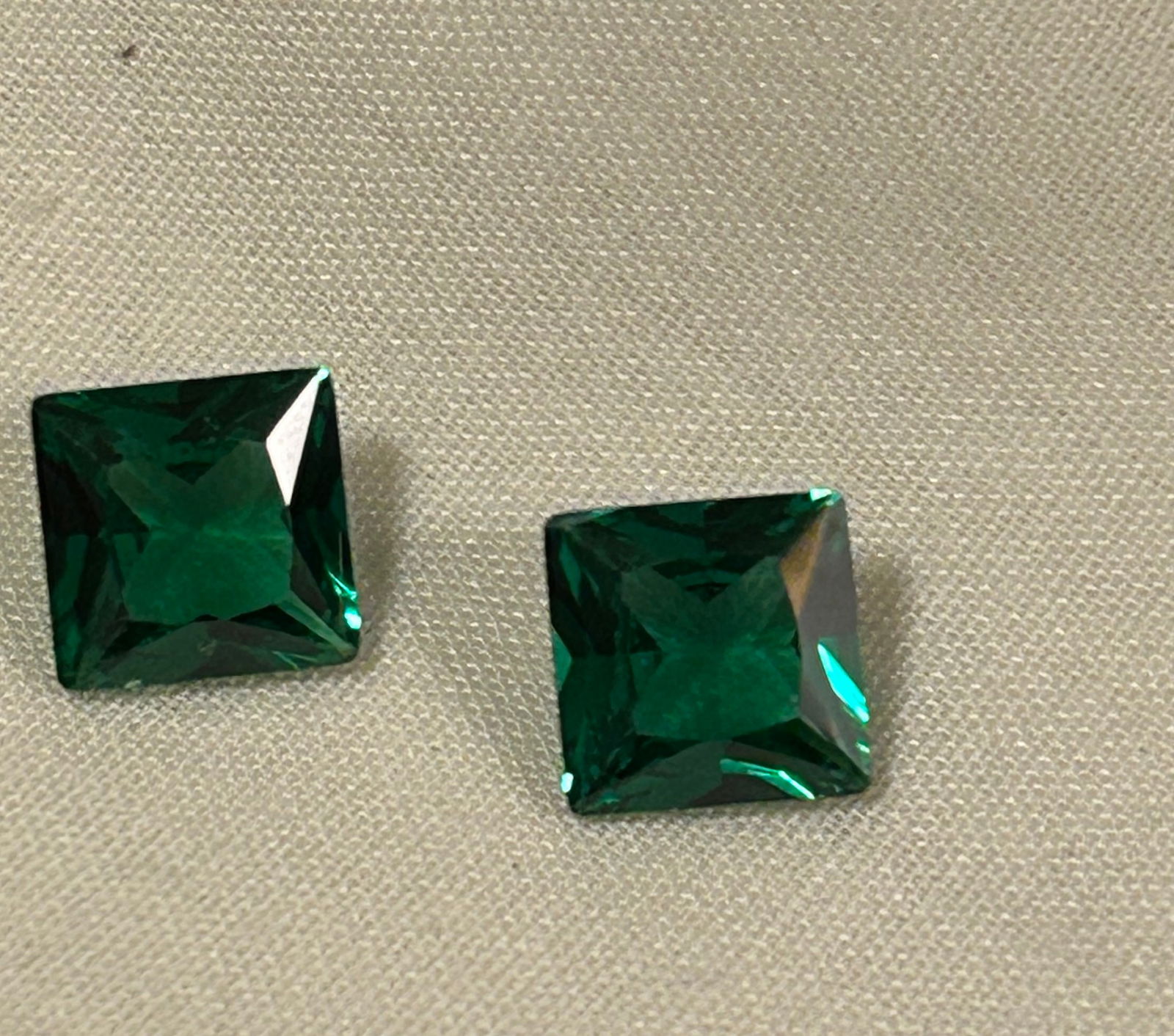 Natural Colombian Green Emerald 7 ct Princess Cut PAIR: Known for their intense green hue and superior quality, these Colombian stones are highly valued for their rich, deep color and rarity, making them ideal for high-end jewelry or investment.