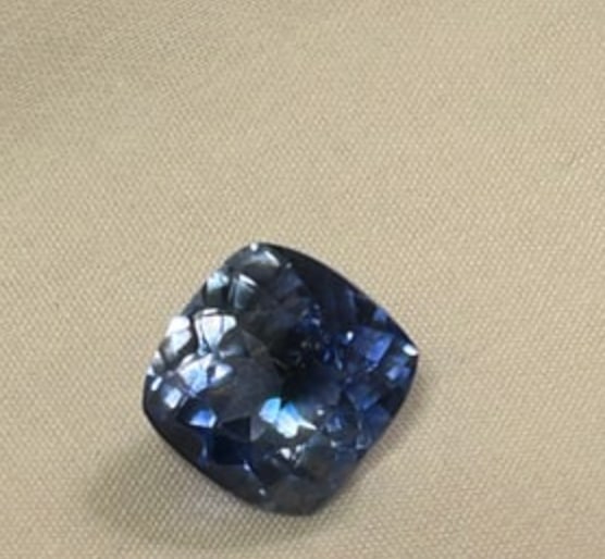 Untreated Natural Kashmiri BLUE Sapphire Authenticed 10 Ct Cushion Cut: A large, valuable gemstone known for its intense, velvety, twilight-blue color, high clarity, and classic square/rounded cushion cut that maximizes brilliance, making it highly sought-after.