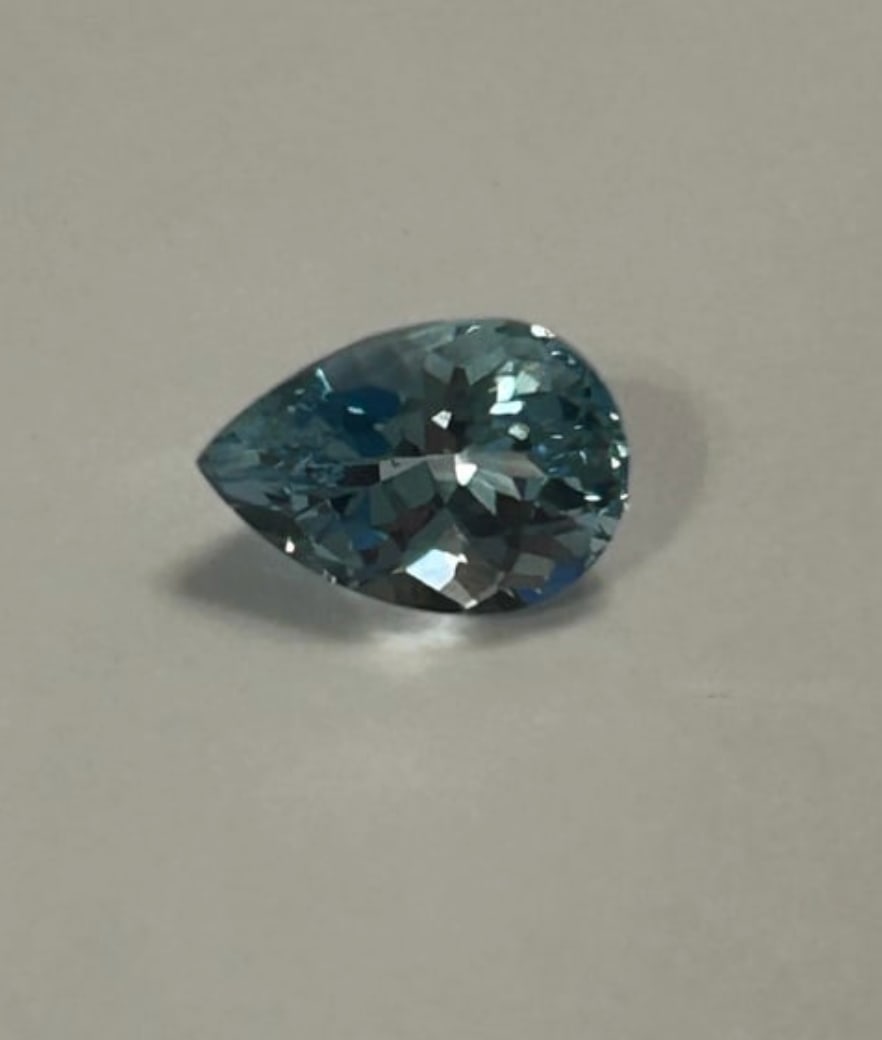 Natural Sky Blue Topaz 1.91ct Pear Cut From Brazil: This Sky Blue Topaz from Brazil is a vibrant, light blue gemstone often compared to aquamarine. Featuring excellent cut and clarity, this pear-shaped stone is ideal for pendants or rings due to its