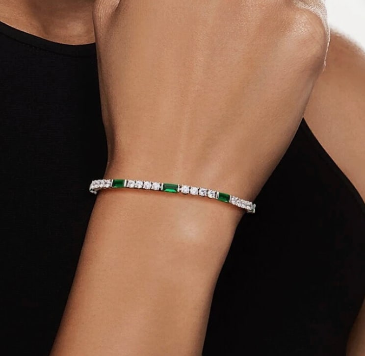 7 ctw Diamond and Emerald Tennis Bracelet: a luxurious, high-carat jewelry piece featuring approximately 7 carats of emerald-cut or princess-cut stones. Set in 14K white gold, offering a sophisticated, durable design with intense green color