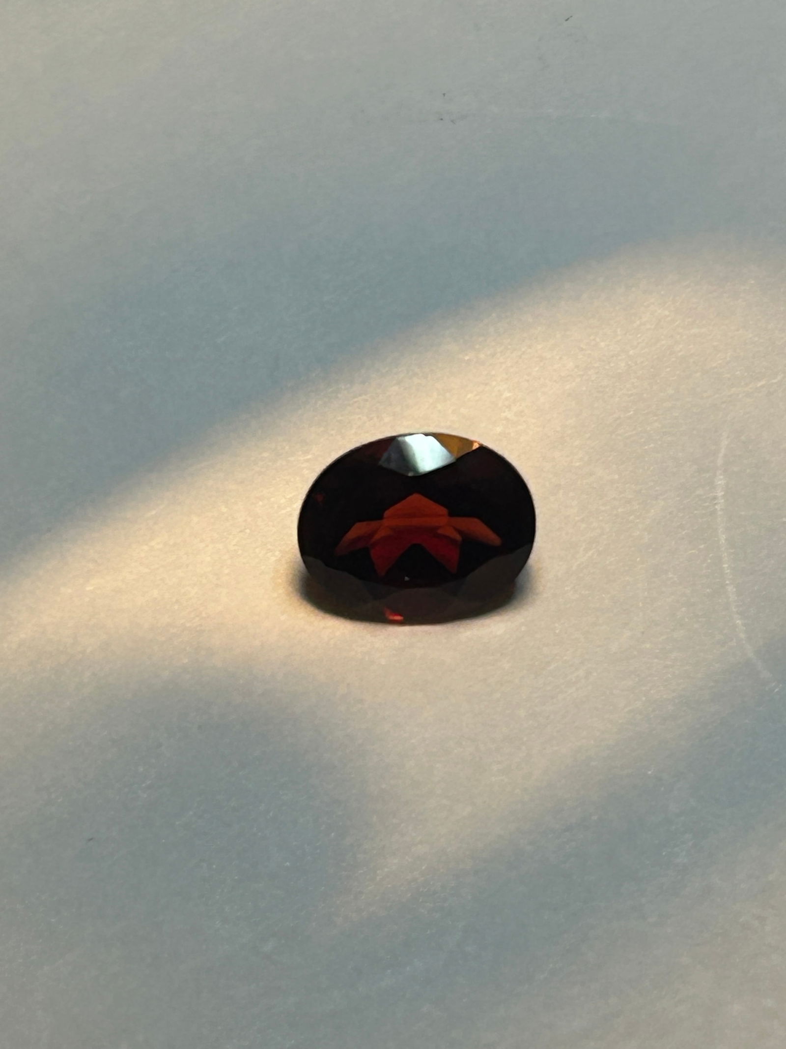 Natural Almandine Garnet 2.22 ct Oval Cut from Brazil: displays a rich, deep red to violet-red hue with excellent, often eye-clean (VS/VVS) clarity. Originating from Brazil, this untreated iron-aluminum garnet boasts high refractive indices, providing