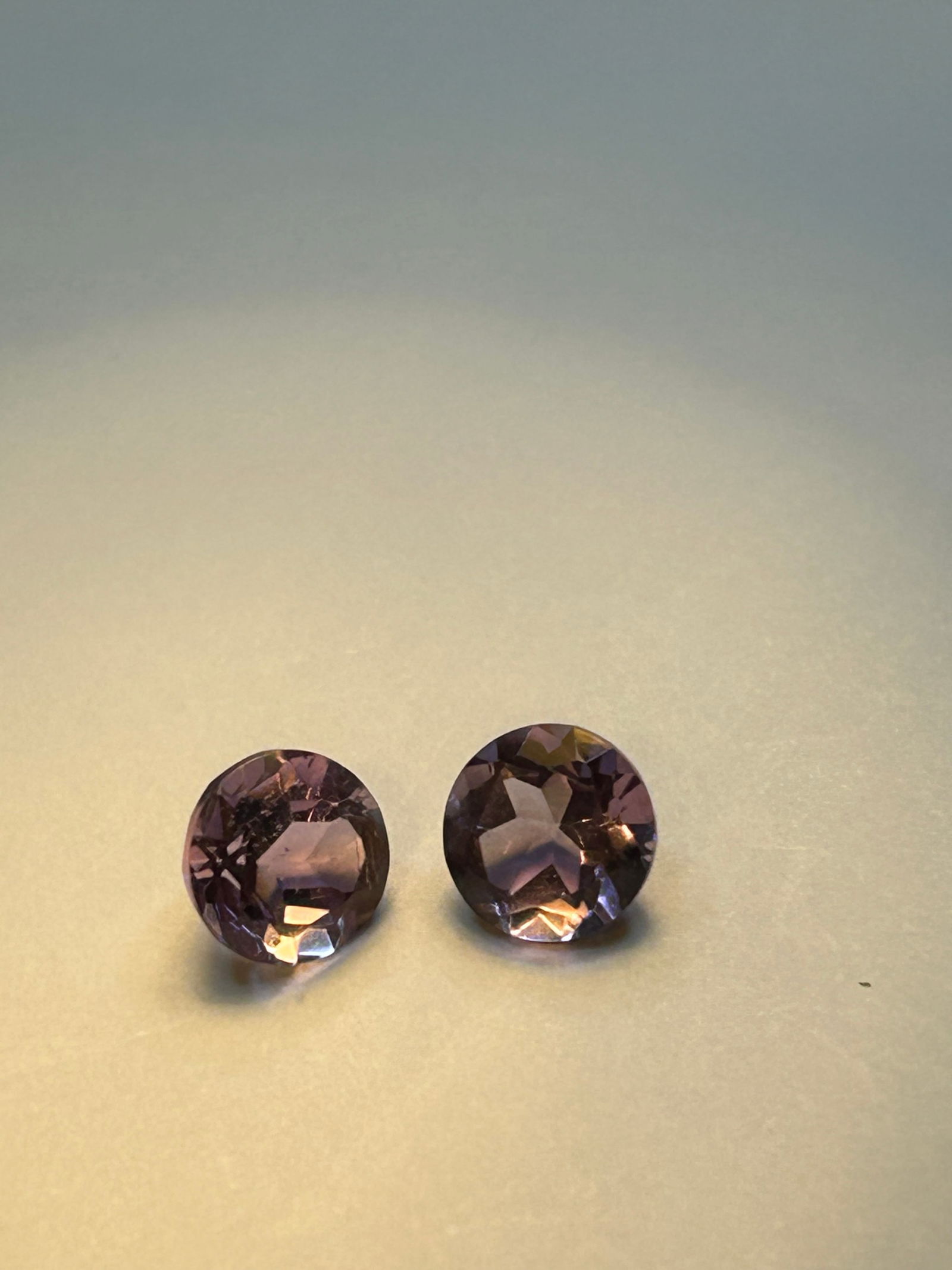 Natural Amethyst 2.67ct Round Cut PAIR: Features a classic round cut, ideal for earrings or matching jewelry sets. These stones are violet-purple in color sourced from Brazil and exhibit high clarity (VVS).