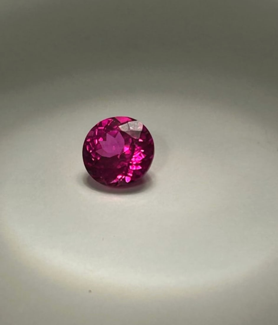 Flawless Natural Mogok Pink Ruby 5 Ct Round Cut: transparent, eye-clean, and "flawless"