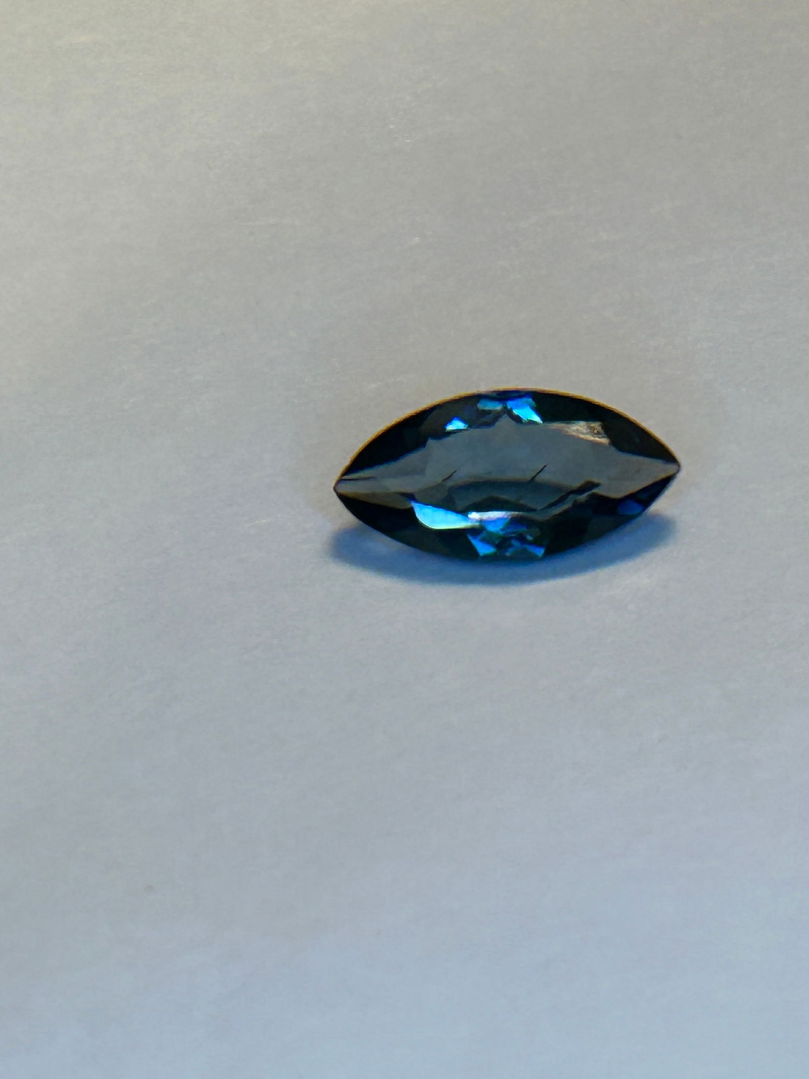 Natural London Blue Topaz 2.13 ct Marquise cut: LONDON BLUE12.2 x 6.3 x 3.9mm a deep blue color,featuring slight gray undertones. Known for excellent durability and a "steely" appearance, this gemstone is "eye-clean" with superior brilliance.