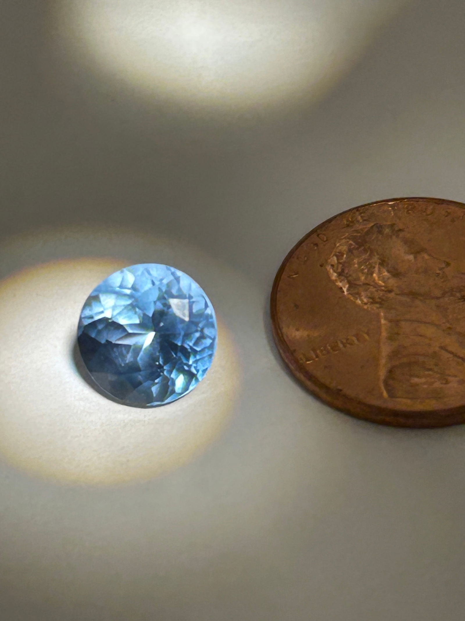 Aquamarine 7.6ct Round Cut No Reserve GIR Certified: a substantial, high-clarity, light-to-medium blue gemstone, often characterized by its brilliant sparkle and transparent appearance. At this weight, round-cut stones offer a classic, symmetrical look