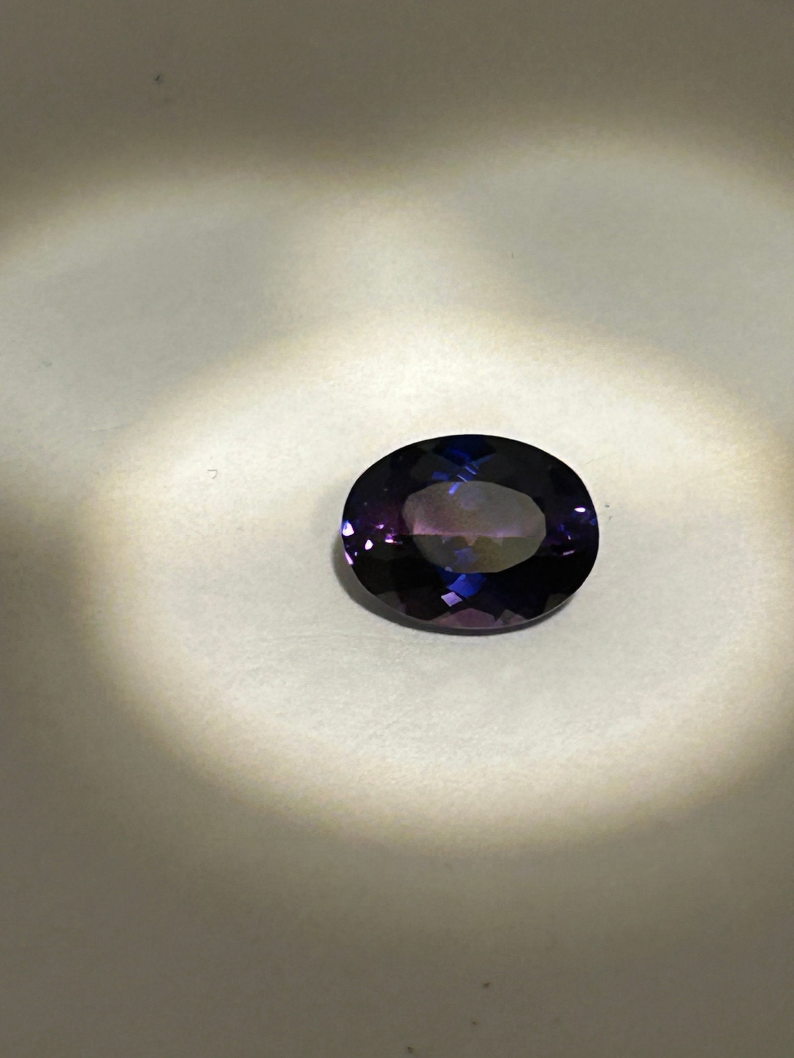 6.95ct Ceylon Java Plum Sapphire Oval Cut No Reserve AGSL Certified: characterized by a distinct purplish-blue color, marketed as a bicolor or color-changing variety. "Java Plum" refers to a deep, rich, purple or violet-purple hue. "Ceylon" sapphires are highly regarde
