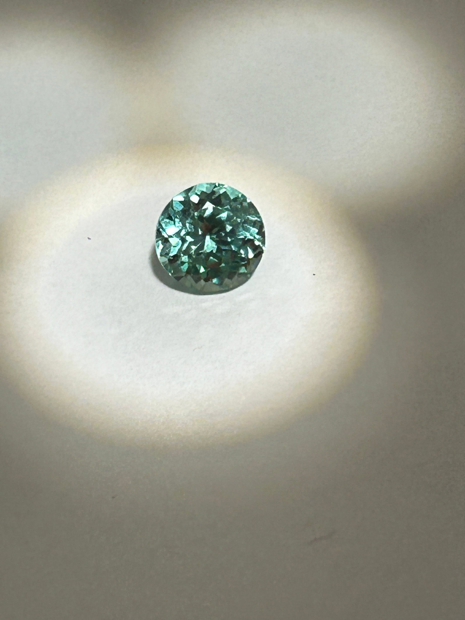 4.20ct Montana Green Sapphire Round Cut No Reserve: Exhibiting a unique blend of teal and mint, often with varied color shifts in different lighting. Known for being ethically sourced from Montana’s Eldorado Bar or Rock Creek, they often have superio
