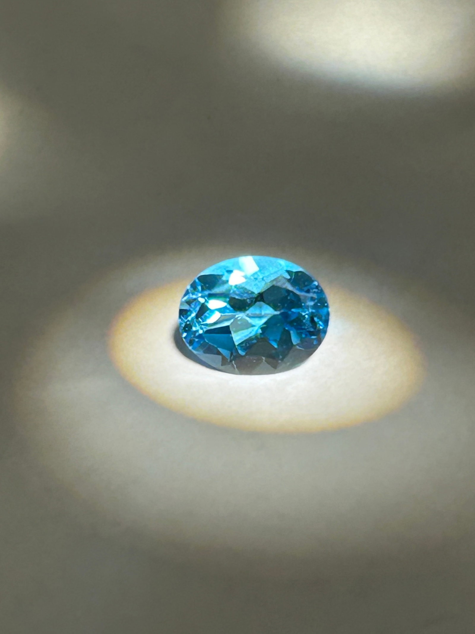 2.20 Carats Intense Blue Topaz Oval Cut IGI Certified: a vibrant, light-blue gemstone designed for maximum brilliance and clarity. "Intense" or "Sky Blue" indicates a brighter, clearer blue than the deeper London Blue variety, often resembling a bright su