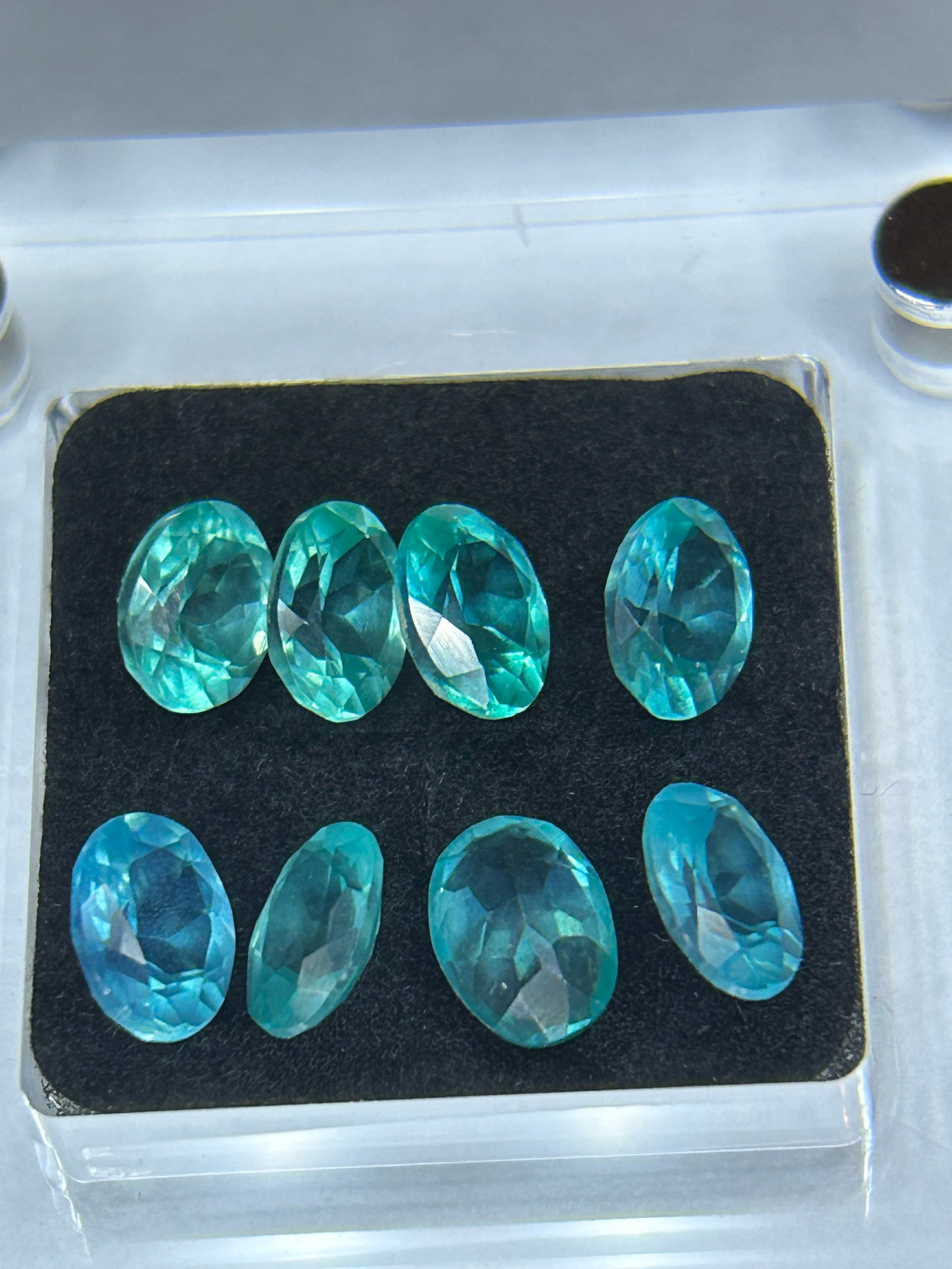 8 Pieces Paraiba Tourmaline Lot Oval Cut GIE Certified: featuring an oval cut designed to showcase their electric blue-green neon color. These stones are sourced from Brazil