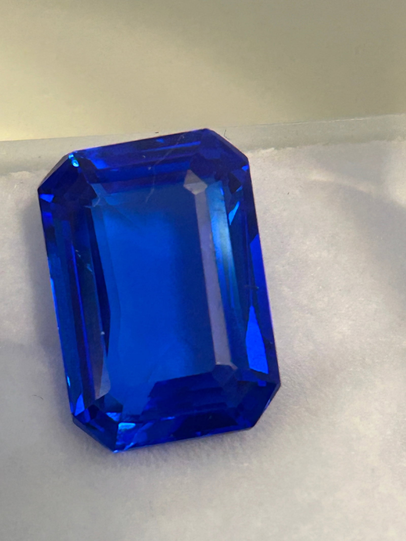 12.35 Carat Myanmar Royal Blue Spinel Asscher Cut EGL Certified: A 12.35-carat Myanmar Royal Blue Spinel, especially in an Asscher cut, is an extraordinarily rare and high-value gemstone, given the rarity of large blue spinels. Originating from the Mogok Valley, it