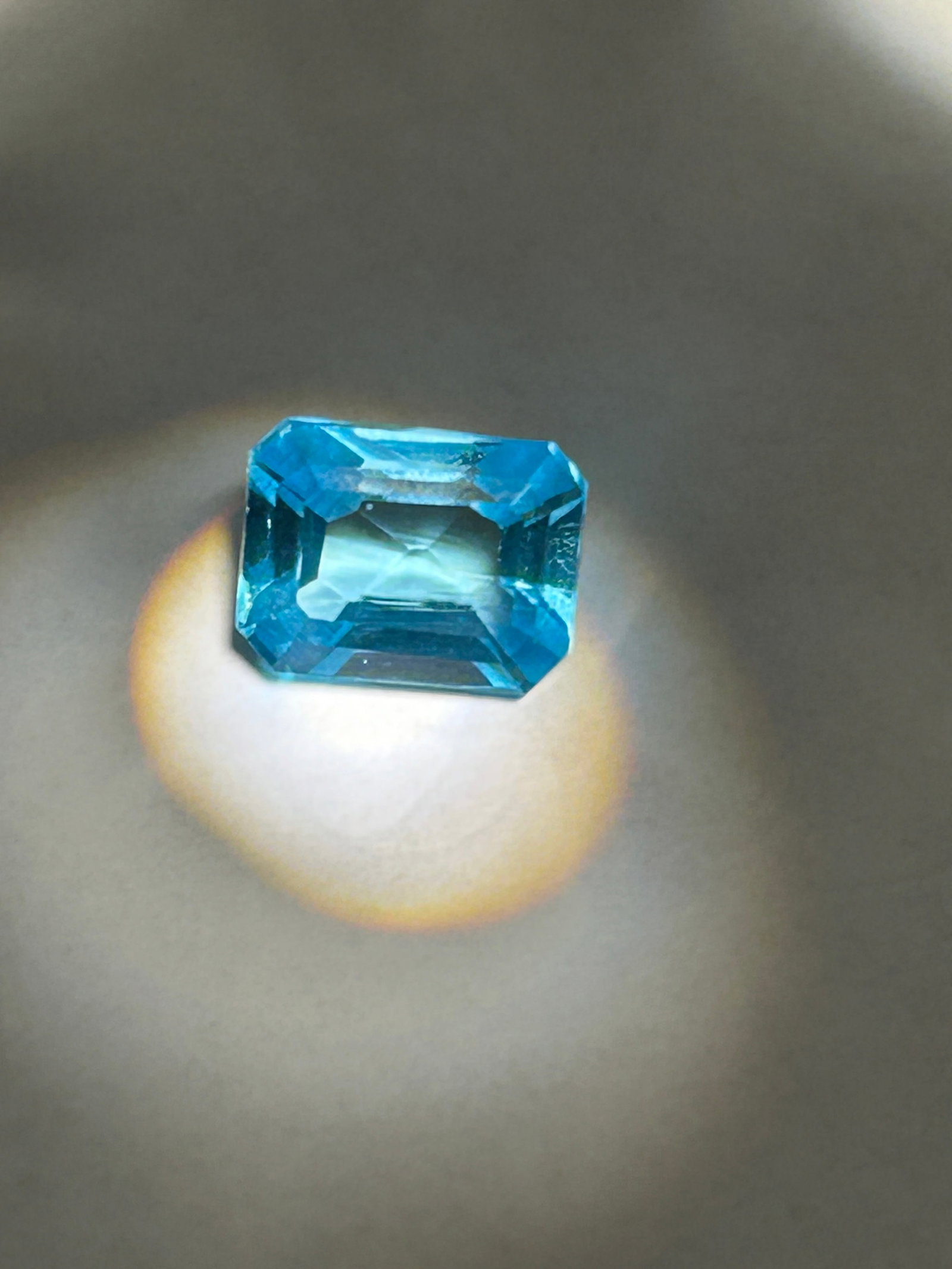 3.00 Carat --Brazilian Neon Tourmaline -- Step Cut --GIE Certified: characterized by an "electric" neon blue or green glow caused by copper. A step-cut (such as emerald or octagon), as opposed to a brilliant cut, is often chosen to maximize the vivid color and show of
