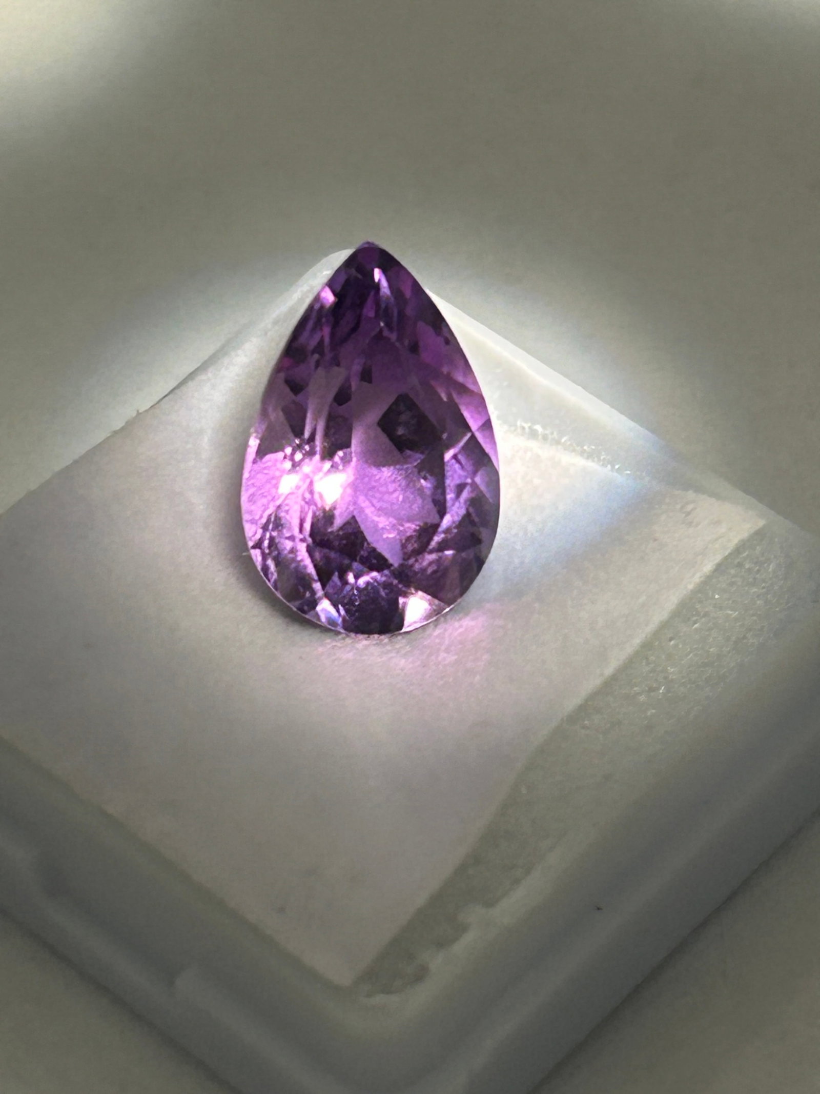 6.15 Carat Soft Sparkling Purple Amethyst Pear Cut IGI Certified: An amethyst with soft, sparkling purple color is described as a high-quality, natural stone suitable for statement jewelry.