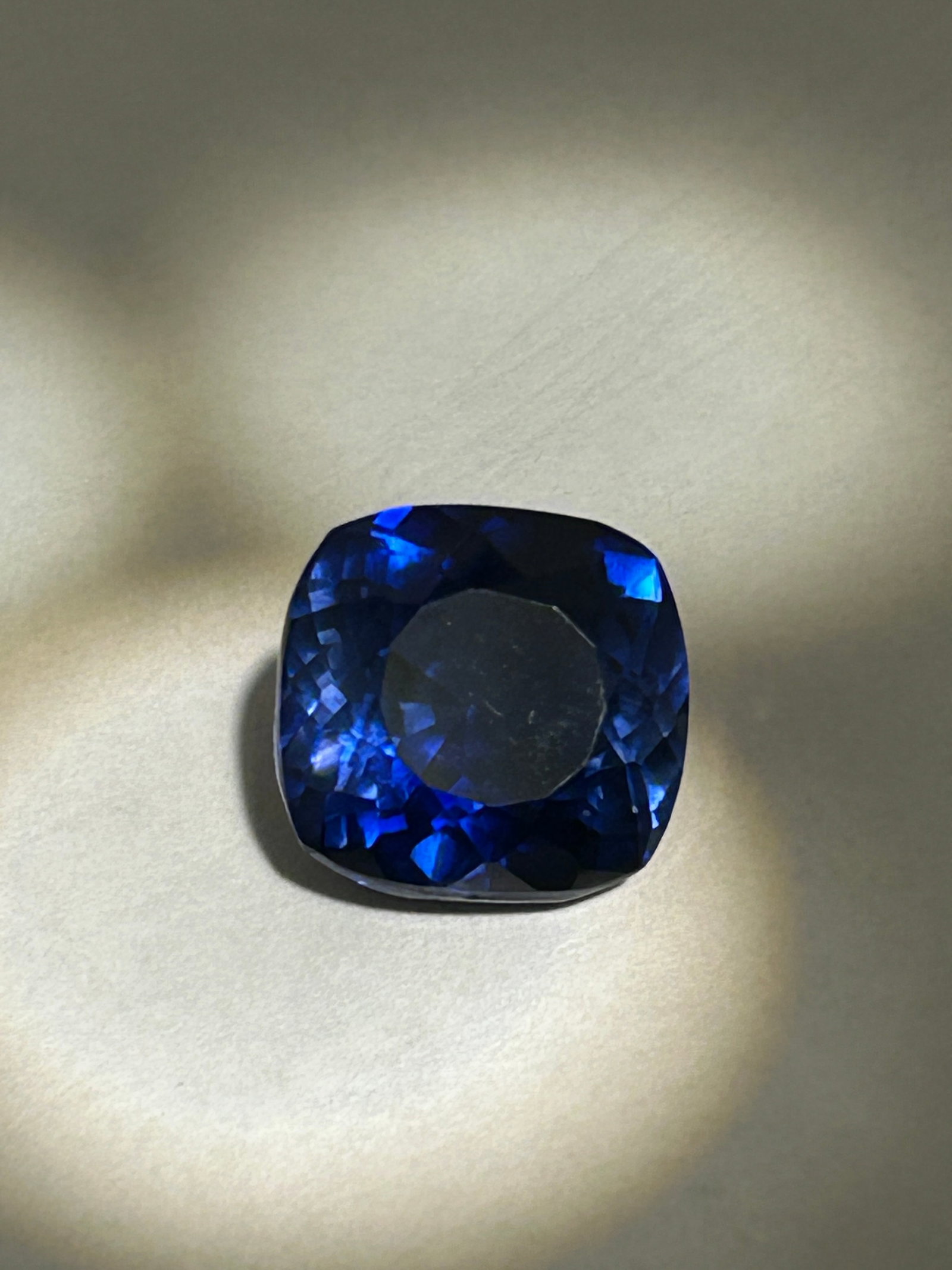 12.15 Carat Royal Blue Sapphire Cushion Cut EGL Certified: A 12.15-carat cushion-cut Royal Blue Sapphire is a highly desirable, large-carat gemstone known for its deep, vivid blue color and intense saturation. These sapphires often feature a cushion cut—a s