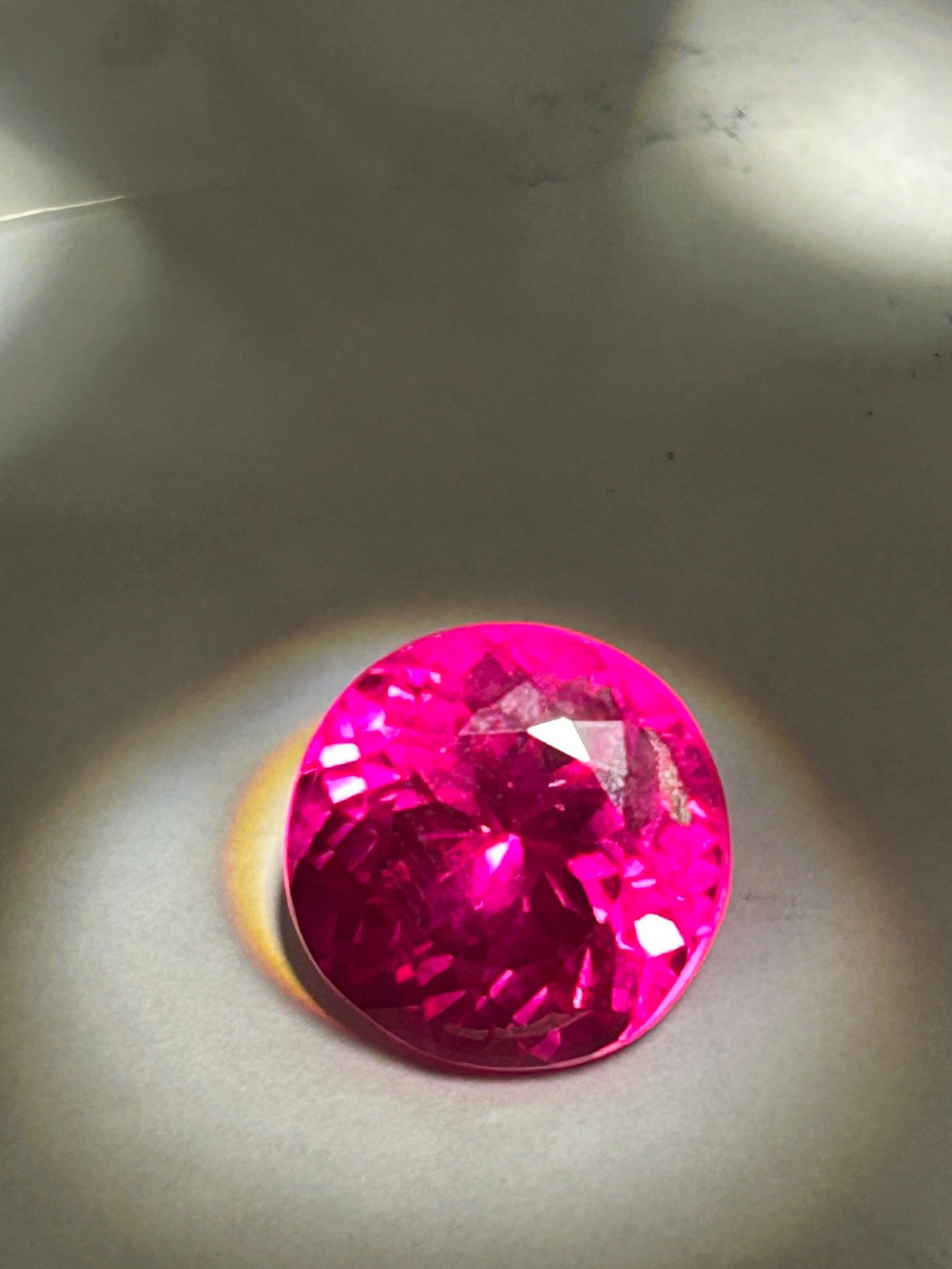 11.80 Carat -- Wyoming Red Ruby -- Round Brilliant Cut --- EGL Certified: Prized for its high investment value and intense color saturation. This gemstone is described as having a deep, intense "Blood Red" hue. Palmer Canyon/Rodeo Queen Mine Known for producing dark red, tr