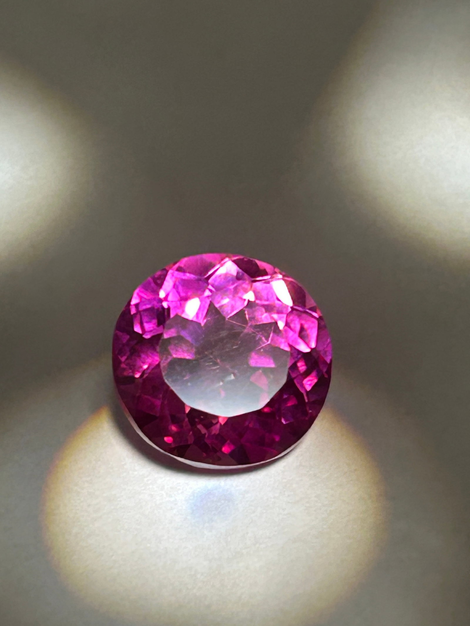 9.08 Carat Pink Sapphire Round Cut GIA Certified: A high-clarity, and durable gemstone offering an eco-friendly alternative to natural sapphires. These stones are physically and chemically identical to mined sapphires, possessing a hardness of 9 on