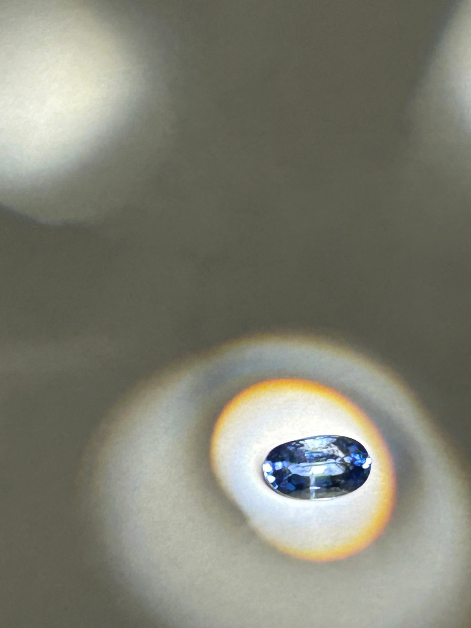 0.66 Carat Natural Violet Blue Sapphire Oval Mixed Cut IGI Certified: a small versatile gemstone, sourced from Sri Lanka. This specific combination of color and cut typically features a vibrant, blended hue of blue and purple (violet) with excellent brilliance due to