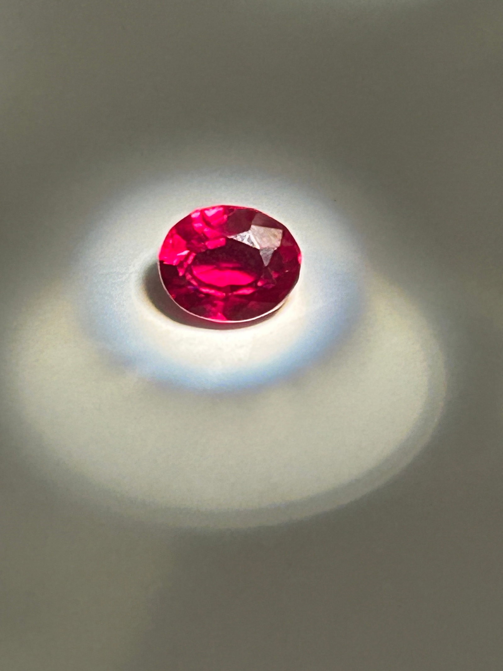 3 Carat Burmese Pigeon Blood Red Ruby Oval Cut GGI Certified: A premier gemstone, exhibiting the coveted "pigeon's blood" color, high fluorescence, and slightly included (SI) clarity. Originating from Mogok. feature a brilliant oval cut to maximize color and wei