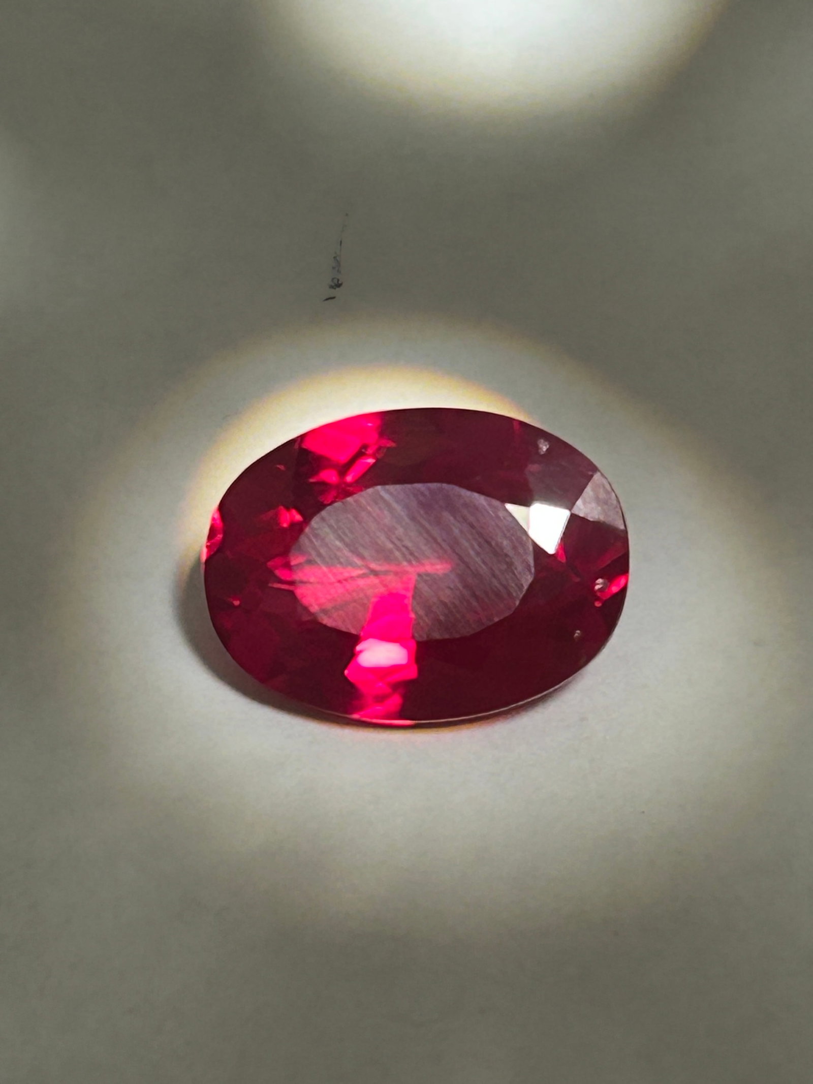 11.20 Carat Red Ruby Oval Cut GIR Certified: featuring deep red or blood-red hues with natural inclusions. Commonly sourced from Mozambique or Burma. Oval shapes are favored for retaining high carat weight.