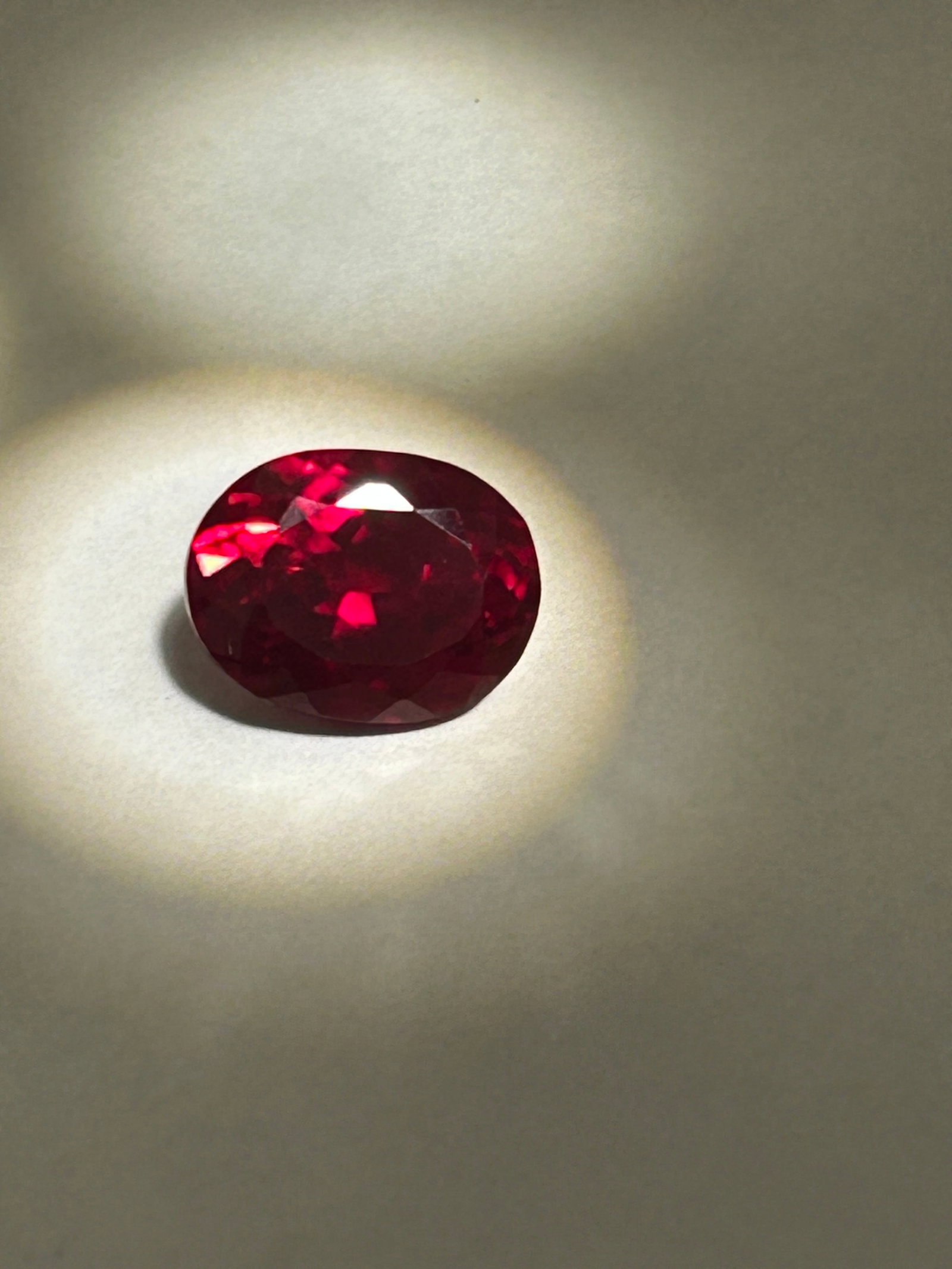 9.30 Carat Blood Red Ruby Oval Cut GIR Certified: Blood Red Ruby is a large, oval-cut gemstone, sourced from Mozambique, featuring an intense, deep red color and excellent faceting for high brilliance. Presenting an eye-clean or slightly included cla