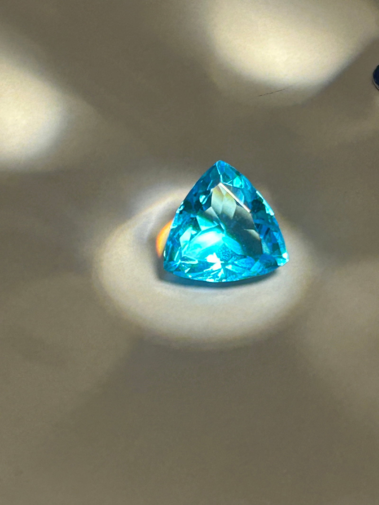 9.30 Carat Aquamarine Brilliant Trillion Cut: A 9.30-carat aquamarine in a brilliant trillion cut is a high-carat, statement gemstone characterized by superior color consistency and clarity.