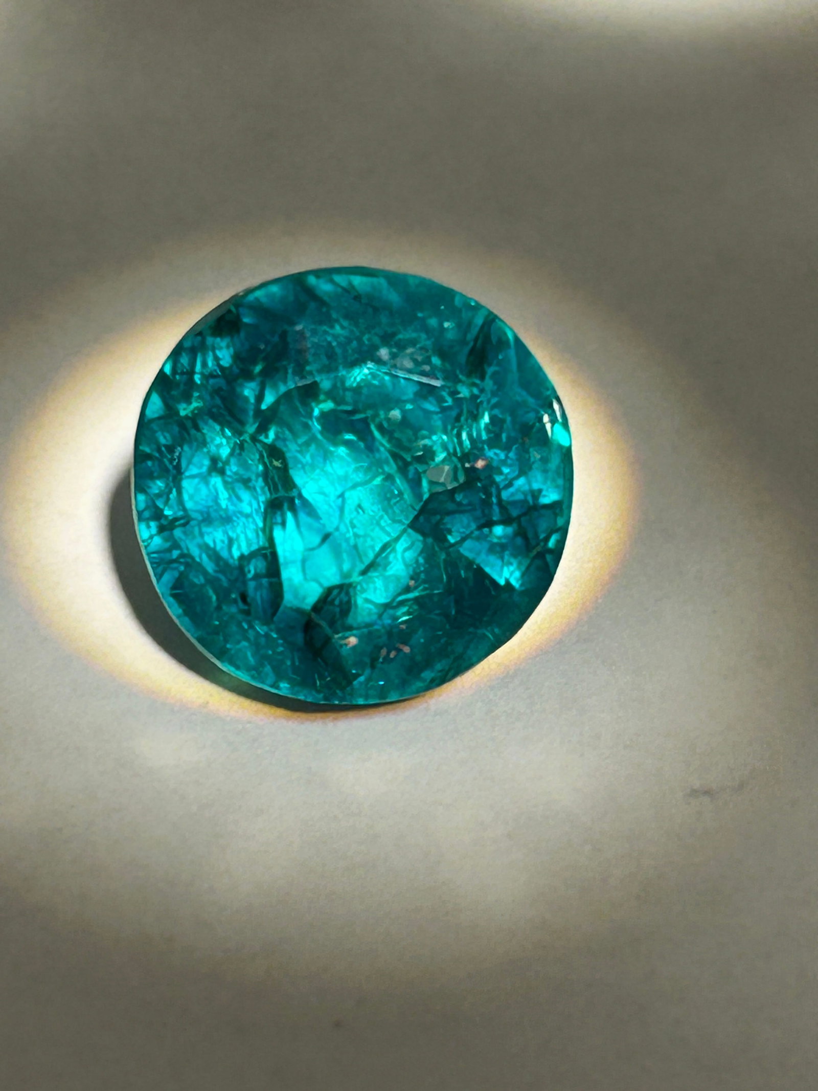 9.90 Carat Emerald Round Cut GGL Certified: highly prized gemstone, combining the deep, green color of beryl with a brilliant, symmetrical circular cut. Often sourced from regions like Colombia or Zambia, a stone this size (roughly 13-14mm diam