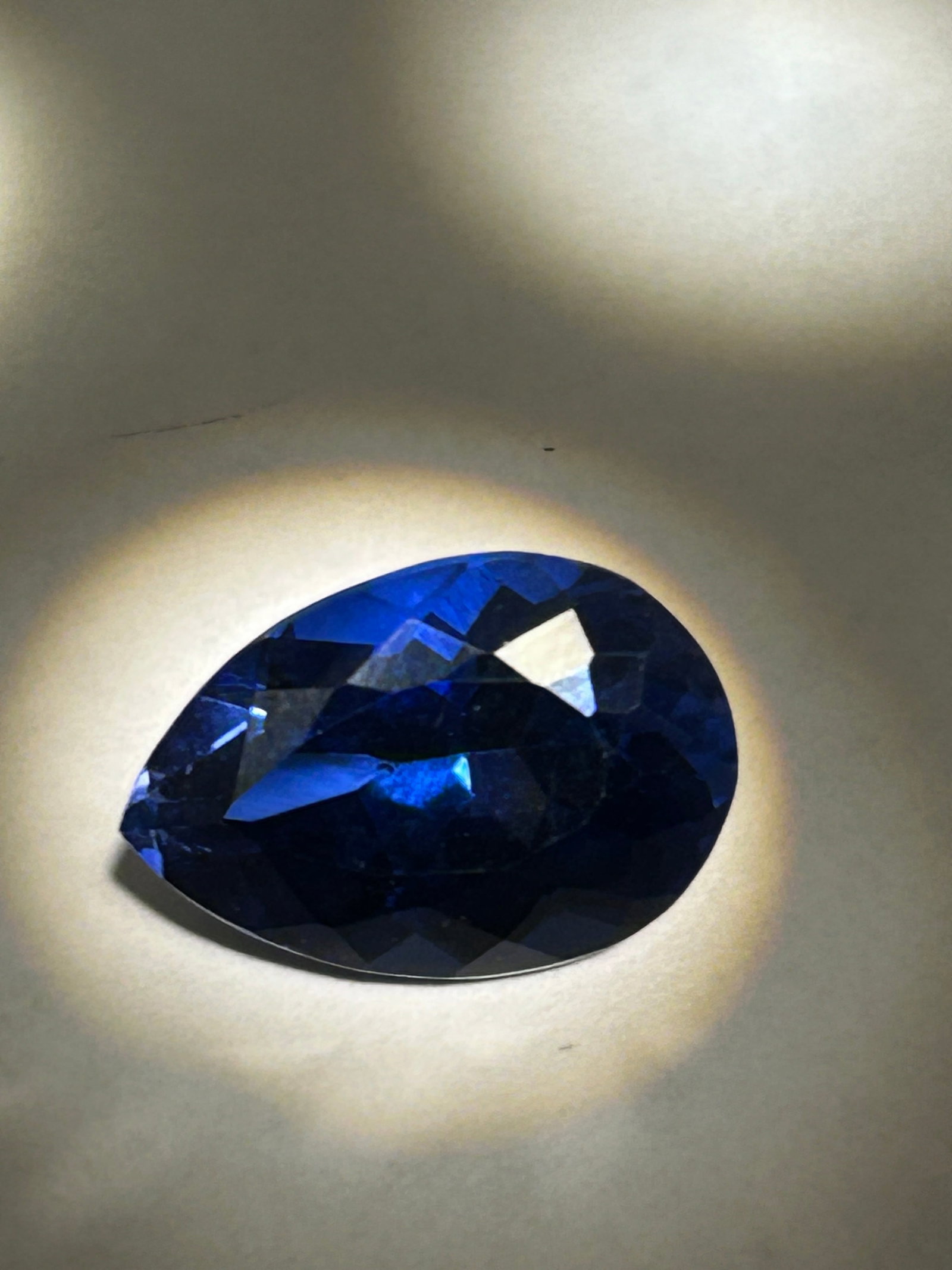 11.50 Carat Royal Blue Sapphire Pear Cut EGL Certified: high-carat gemstone that offers a classic "teardrop" aesthetic, often used as a centerpiece for statement rings or large pendants. This weight is considerably large for a sapphire, as stones over 5 ca