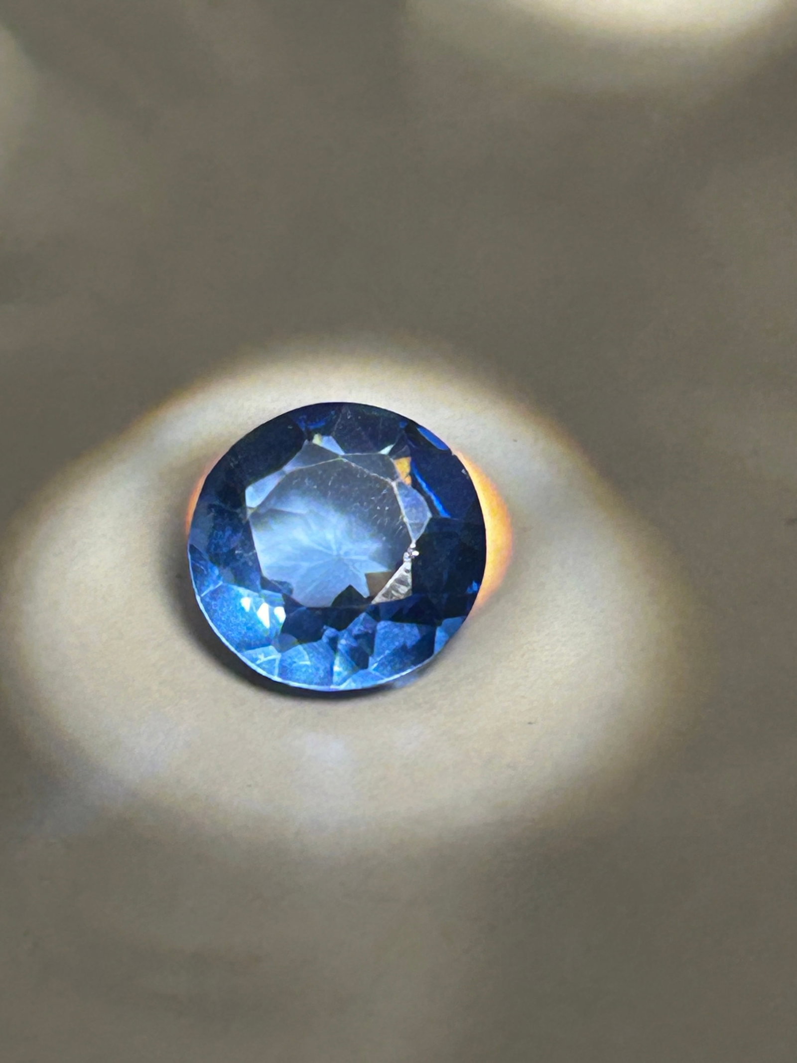 6.90 Carat Blue Tanzanite Round Cut GGL Certified: A high-quality stone represents a significant investment piece, with price per carat typically higher for stones over 3 carats. A perfectly round-cut stone of this size is highly desirable for its bri