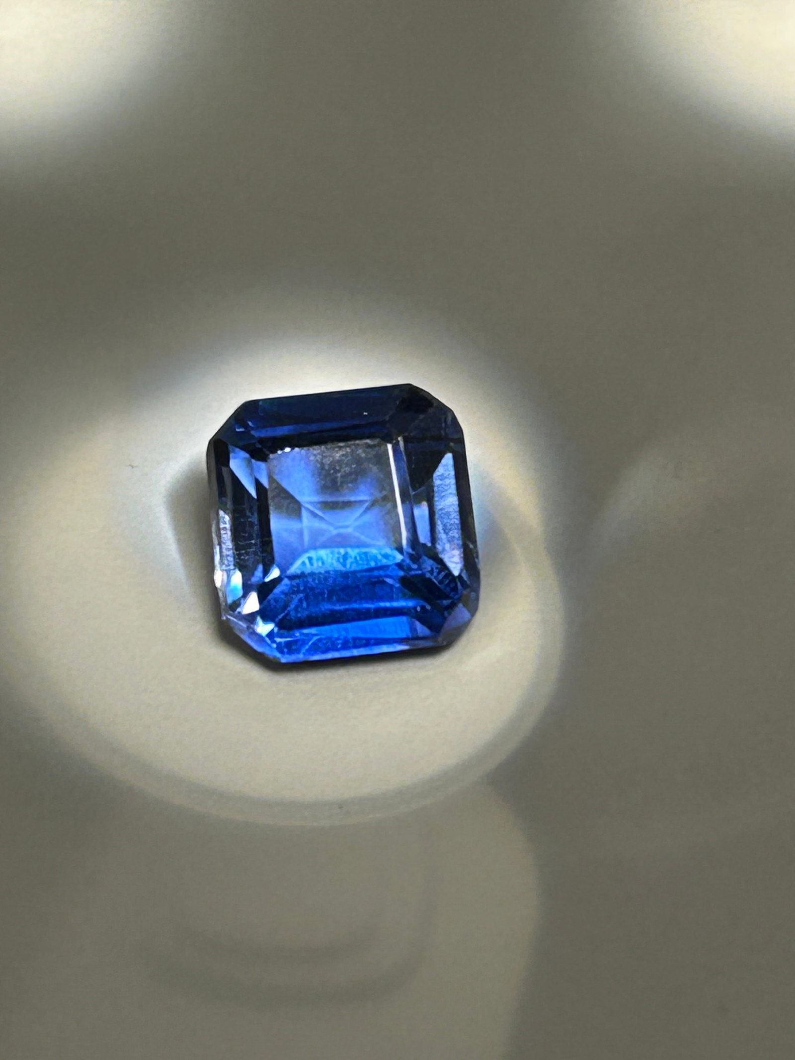 11 Carat --- Blue Tanzanite --- Asscher Cut: Featuring a square, step-cut facet pattern with deeply cropped corners, creating a vintage "hall of mirrors" effect. These stones typically display a deep blue or violet-blue hue, with AAAA quality, h