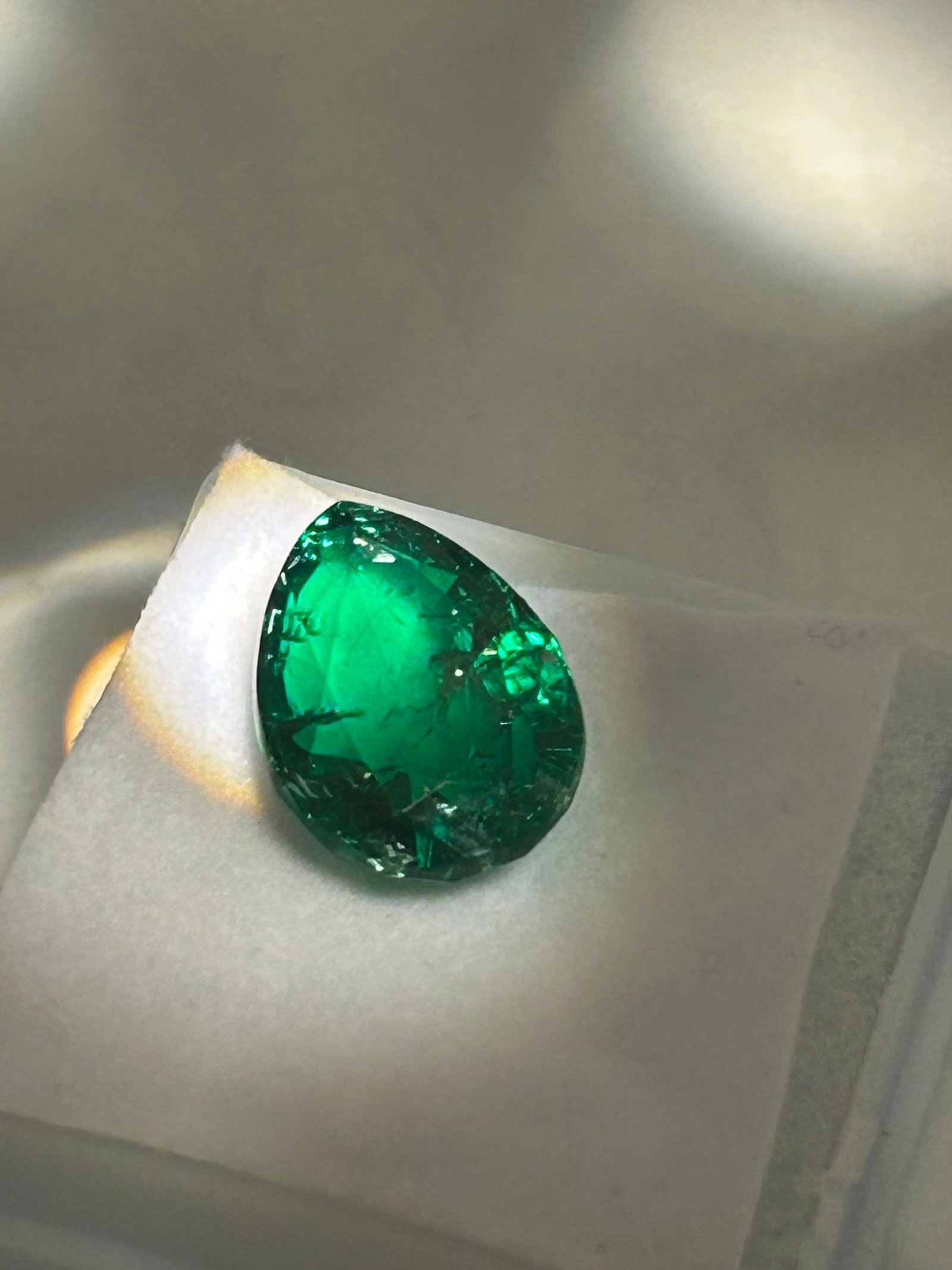 8.50 Carat --- Colombian Emerald --- Pear Cut: Featuring a pear cut, characterized by a rounded end and appointed tip, offering an elegant, elongated silhouette. It typically displays a deep, rich, green hue with strong saturation, exhibiting a sl