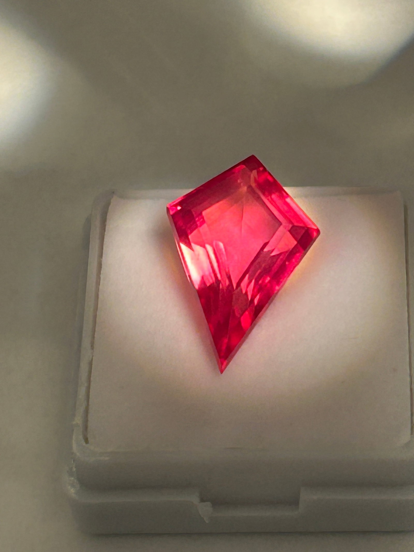 10.00 Carat ---- Ceylon Padparadscha Sapphire---- Fancy Kite Cut ---- EGL Certified: A distinct, delicate mix of pink and orange (often described as lotus or sunrise). The best specimens show a vivid, even blend of both. a sharp, geometric shape. These sapphires are prized for their s