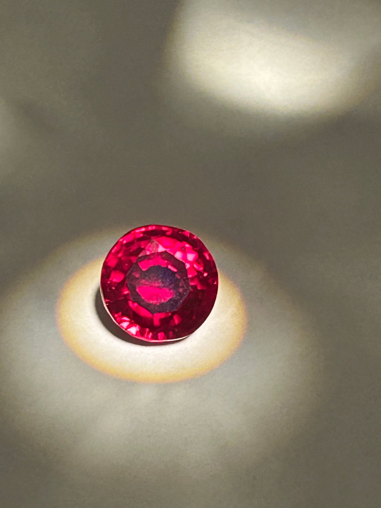 6.45 Carat ---- Mozambique Blood Ruby---- Round Cut ---- GGI Certified: A natural, round-cut, vivid red gemstone prized for its high transparency and intense color. Featuring eye-clean clarity, these Mozambique stones are highly desirable for their brilliant red hue rathe