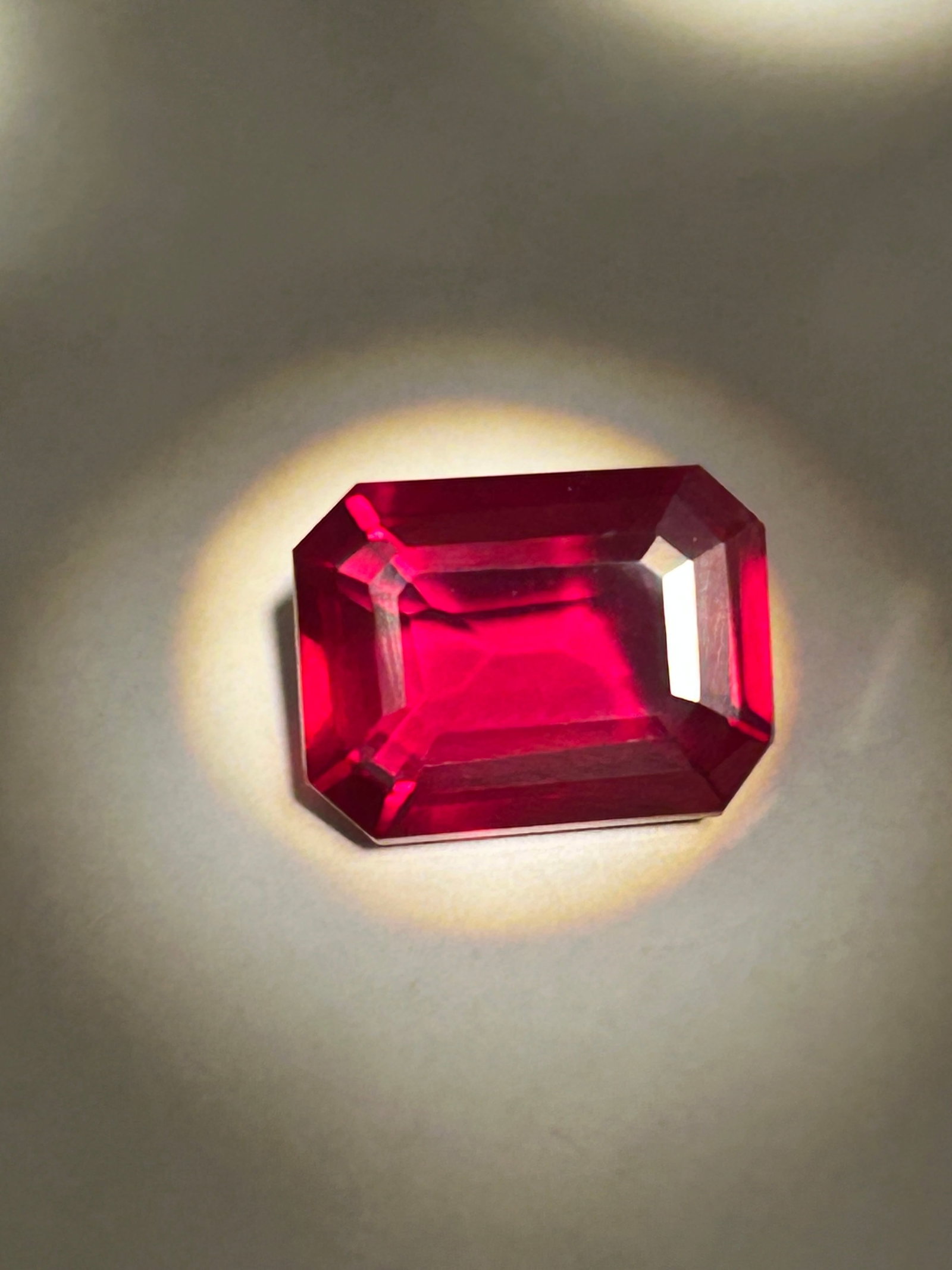 10.55 Carat --- Myanmar Red Ruby --- Emerald Step Cut: Natural red ruby from Myanmar features a distinct emerald step cut, offering a rare combination of high carat weight, deep, "pigeon's blood" red hue, and exceptional clarity. Sourced from the famous M