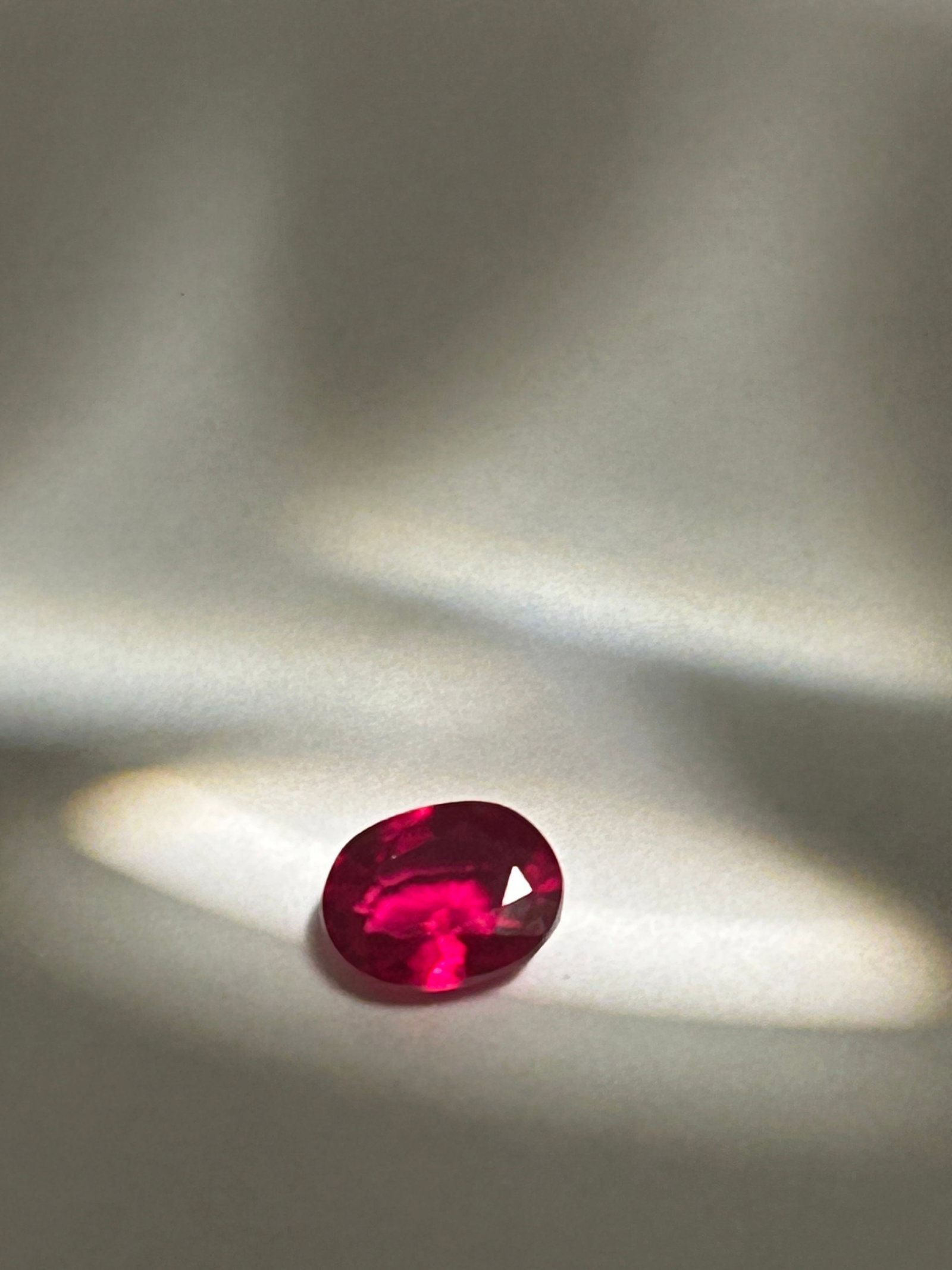 1.80 Carat --- Mogok Pink Ruby --- Oval Cut --- GIE Certified: a highly desirable gemstone from Myanmar (Burma) known for intense, vibrant color and exceptional fluorescence. Often described as having a rich pink-red hue, these stones feature high transparency, r