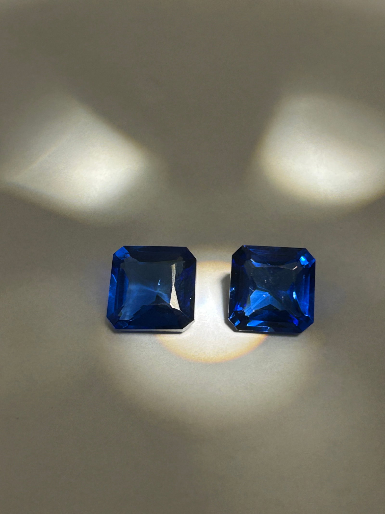 14.90 Carat --- Blue Sapphire --- Radiant Cut --- GGI Certified PAIR: Radiant Cut Blue Sapphire is a substantial and rare gemstone, combining a very large, impressive carat weight with a precise, modern, and highly brilliant cut. The radiant cut blends the rectangular, 