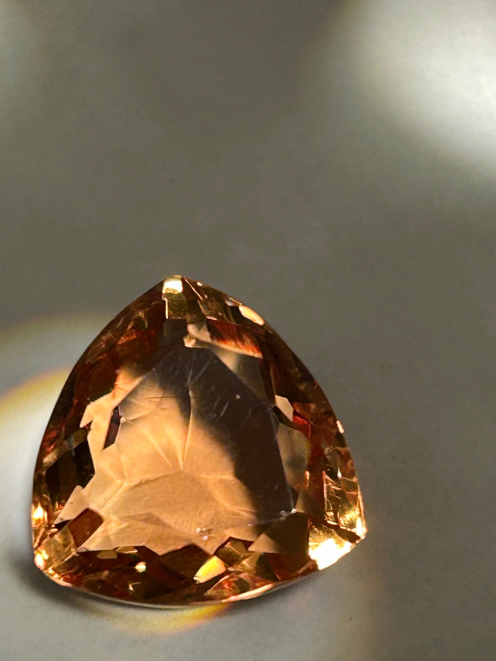 13.25 Carat --- Bi Color Natural Alexandrite --- Trillion Cut --- EGL Certified: A 13.25-carat, trillion-cut, bi-color alexandrite is an exceptionally rare and large specimen of chrysoberyl, likely featuring a dramatic, "chameleon-like" color transformation between daylight and in