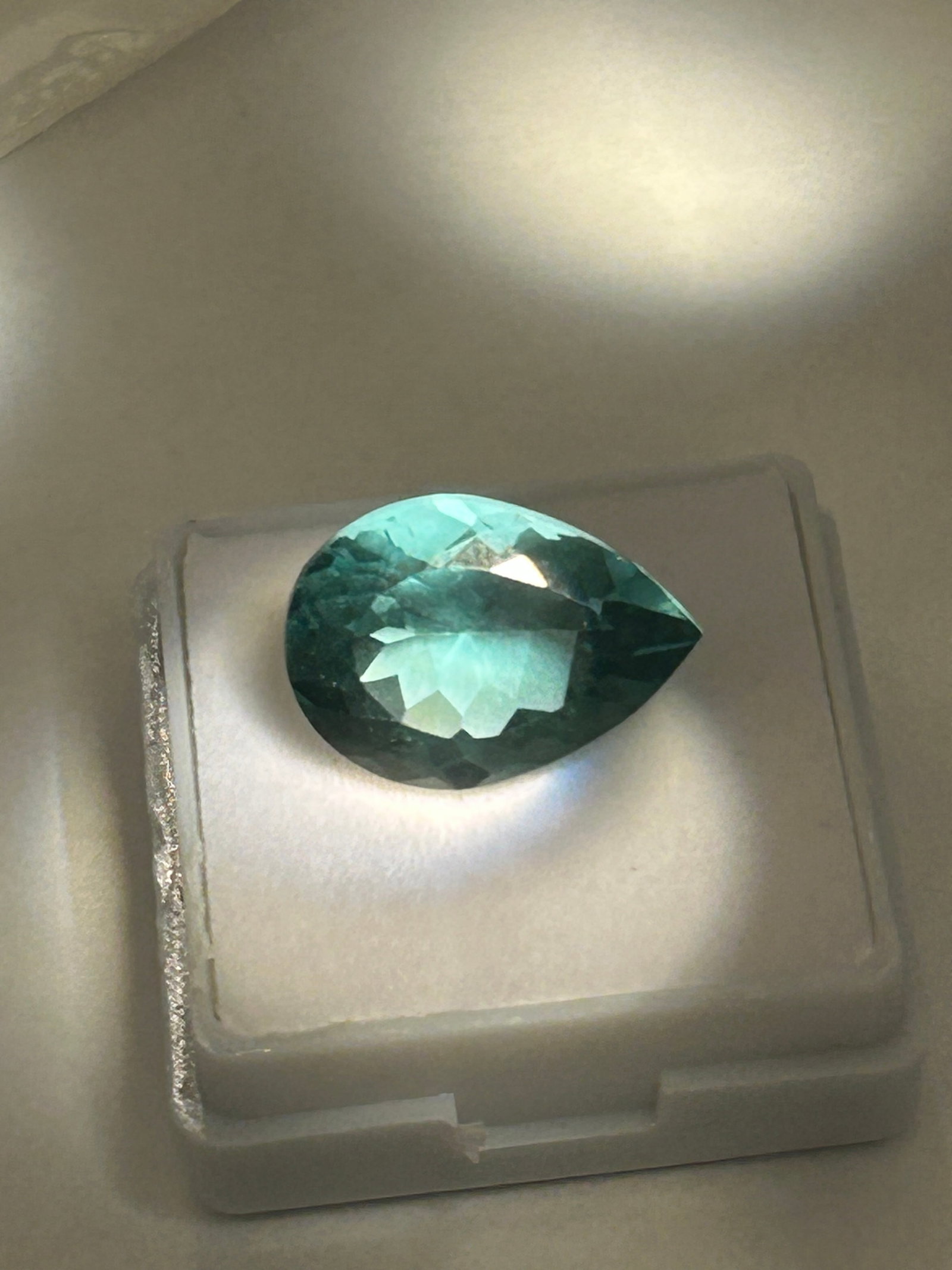10.05 Carat --- Green Sapphire --- Pear Cut --- EGL Certified: bluish-green ("teal") color. At this size, it serves as a substantial collector’s piece or a dramatic statement in jewelry, such as a pendant or a large ring, likely requiring a secure setting to pr